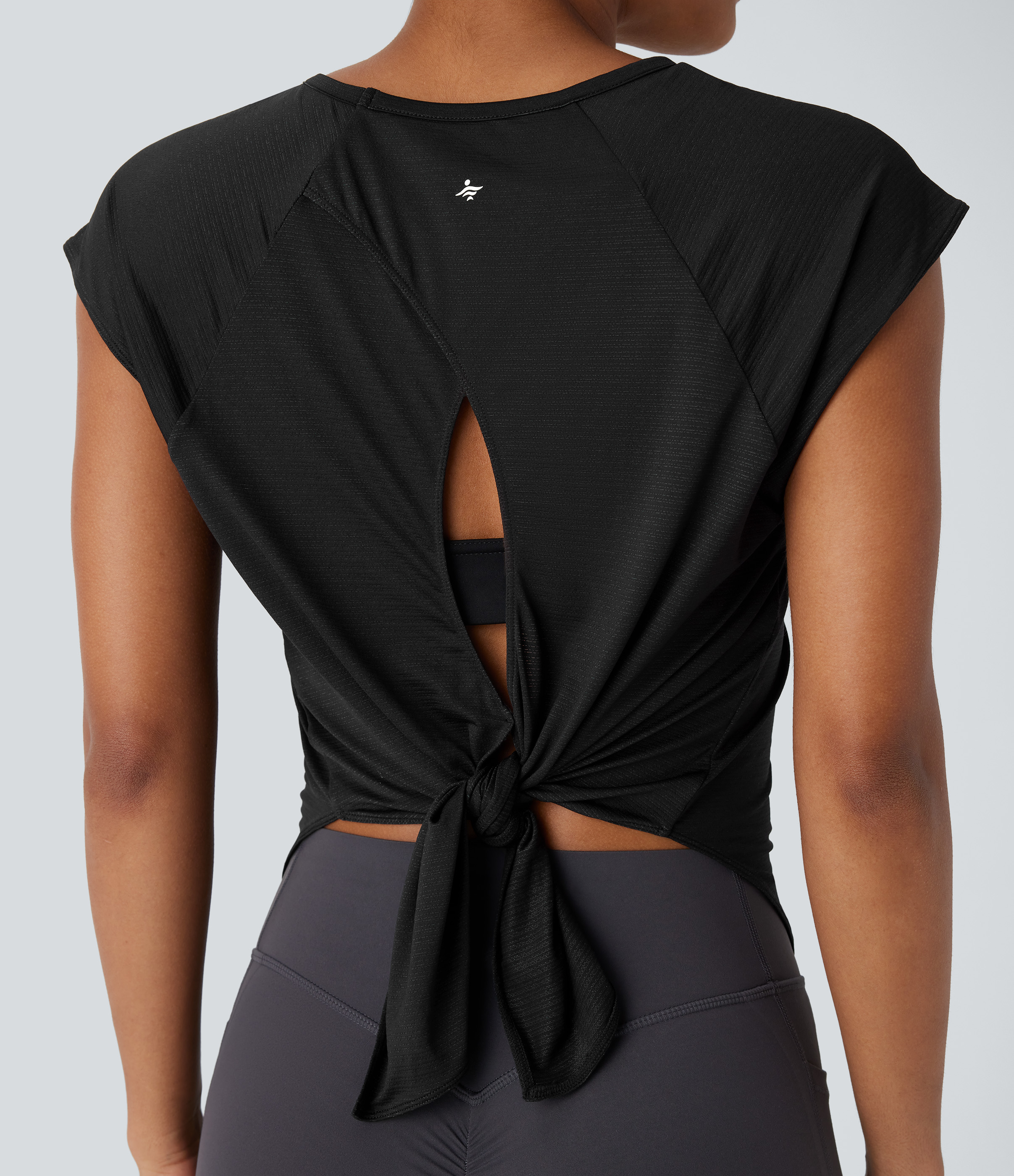 Halara Round Neck Cap Sleeve Split Tie Back Curved Hem Yoga Sports Top  - Black - XS 
