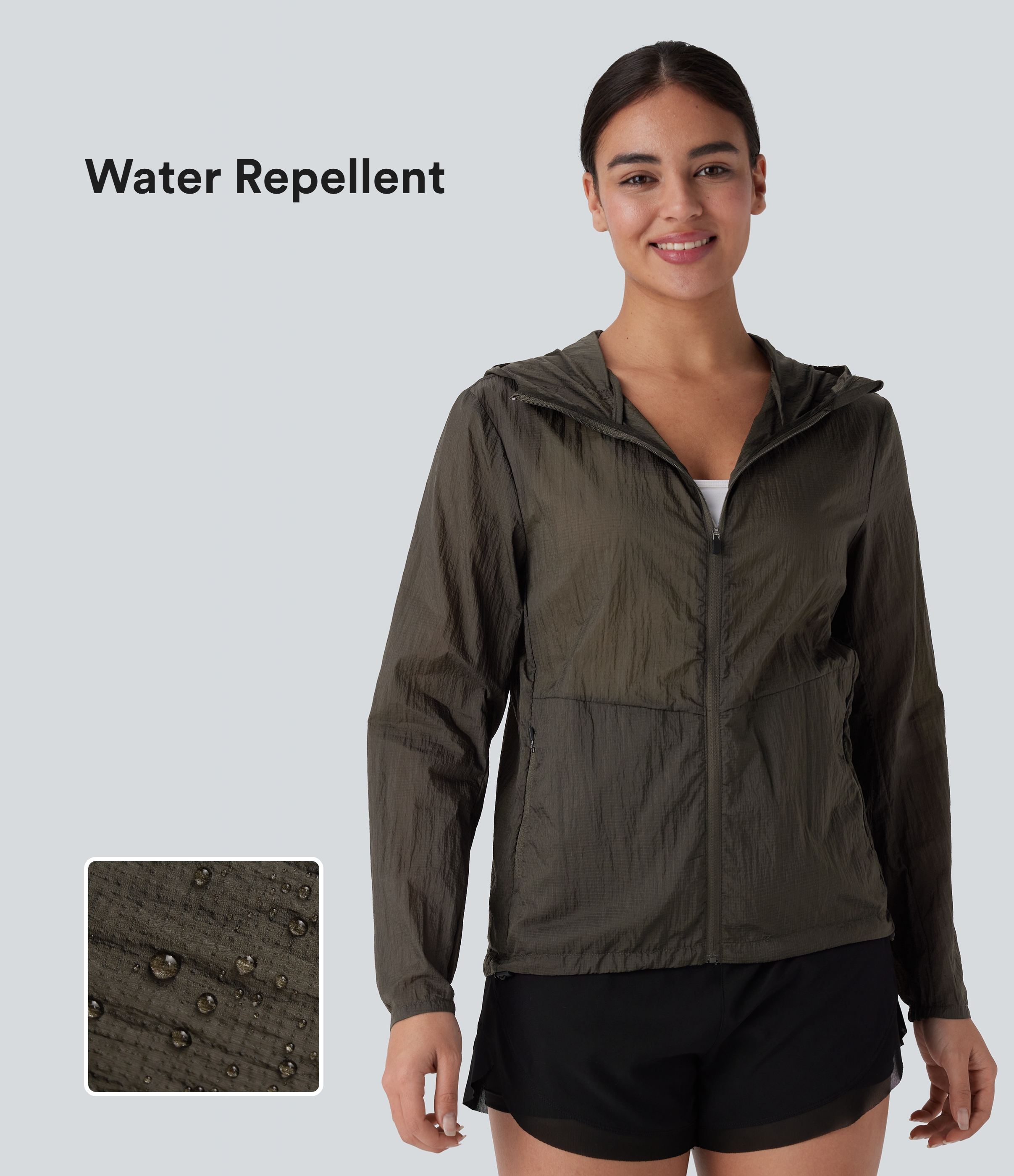 Veste de randonnée imperméable à capuche avec manches longues, fermeture éclair, poches latérales et cordon de serrage ajustable