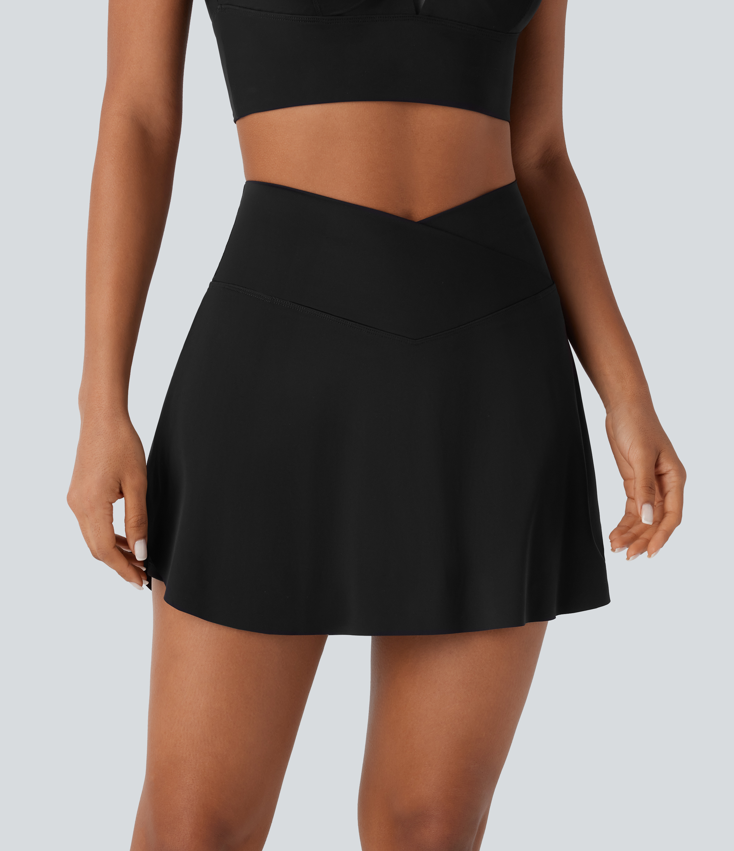 Noir Mini-jupe taille haute croisée 2 en 1 avec poche, technologie InstantCool, séchage rapide / 2