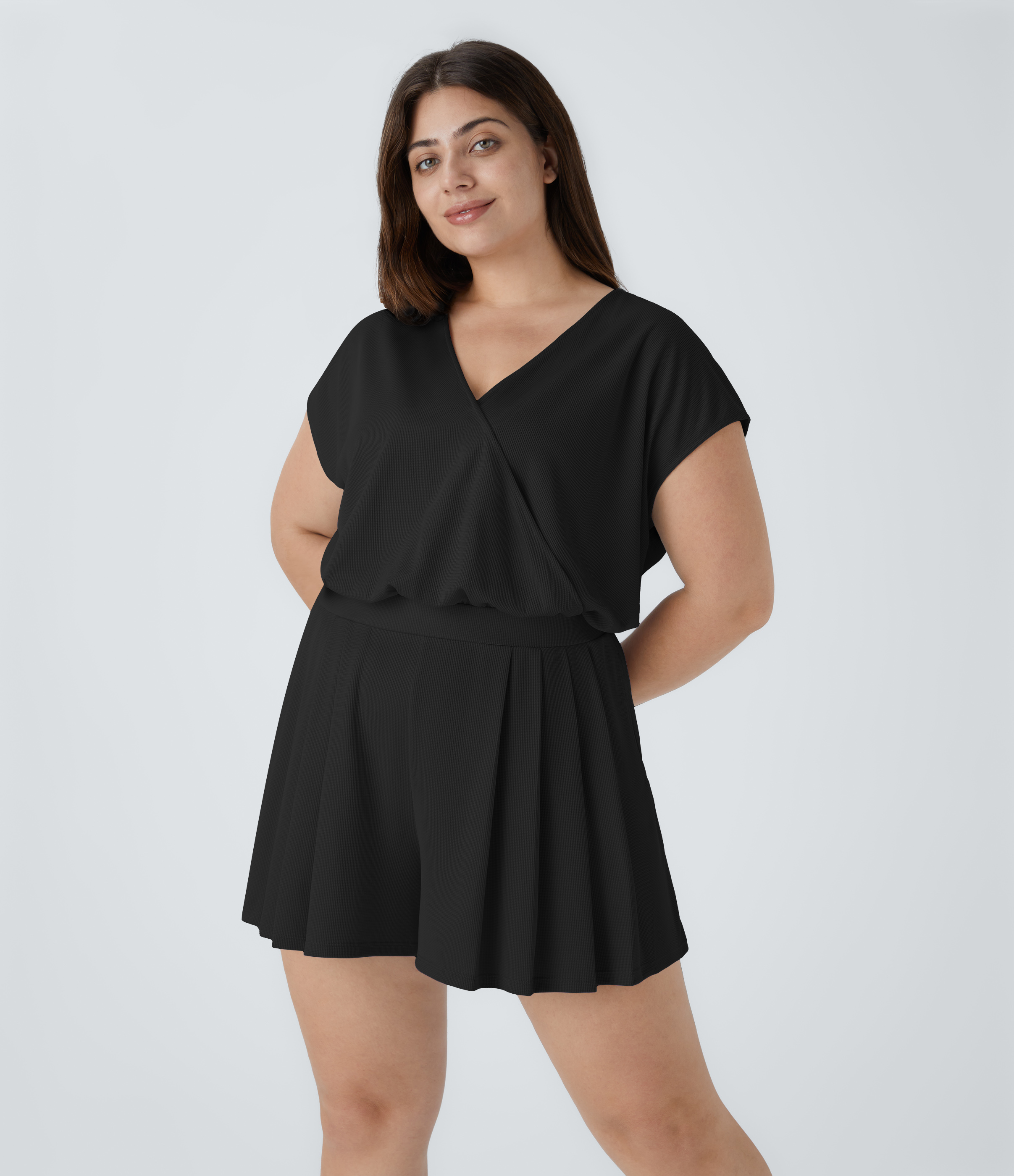 Mono talla grande cuello V manga corta bolsillo lateral plisado