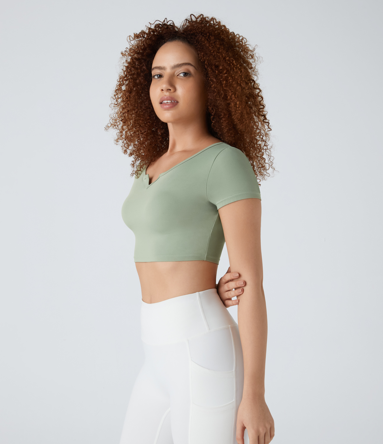 

Halara Softlyzeroв„ў Notched Neck Cropped Skinny Workout Sports Top-UPF50+ - Asparagus