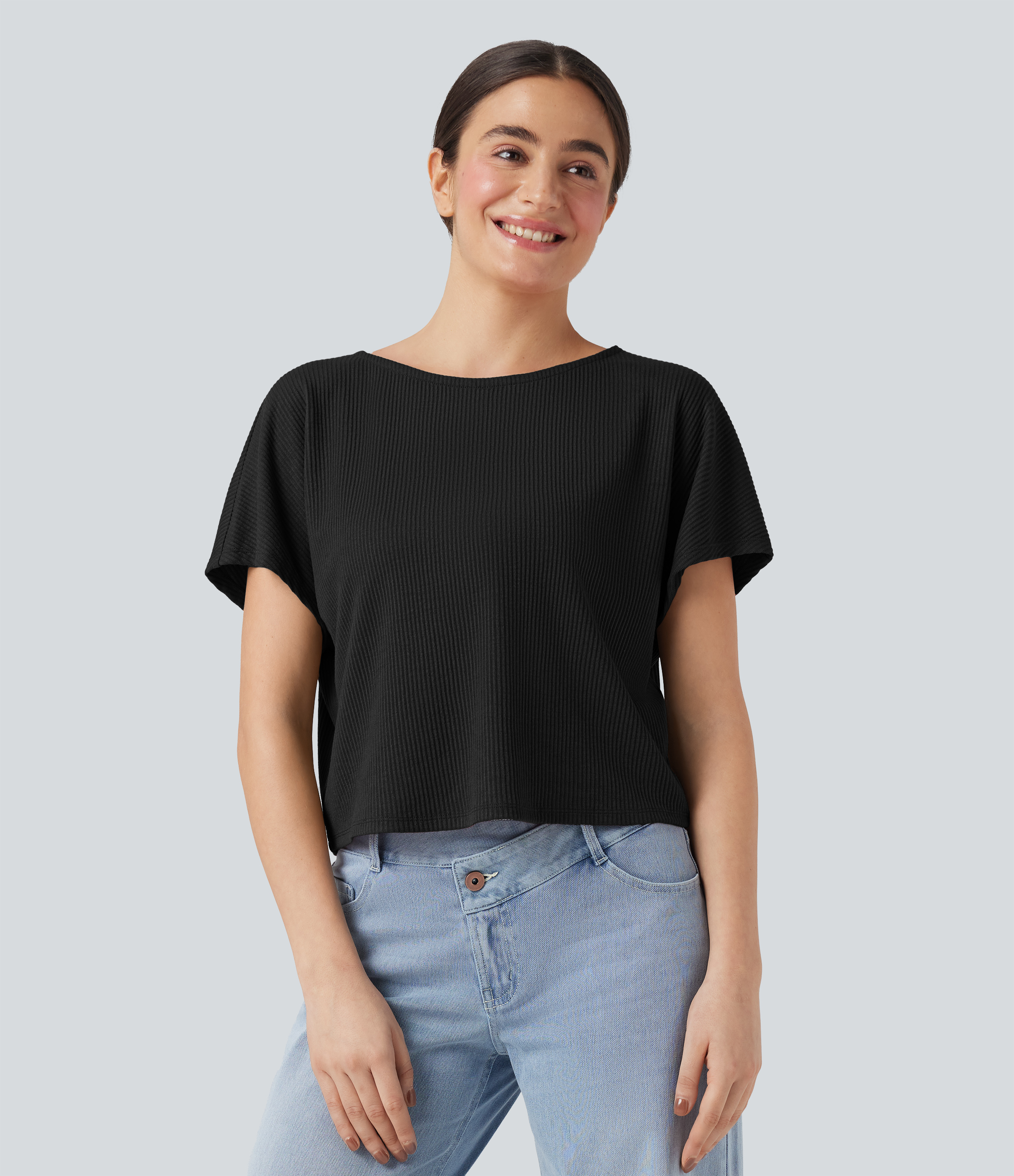 Schwarz Geripptes Strick-T-Shirt mit Fledermausärmeln und lockerer Passform / 1