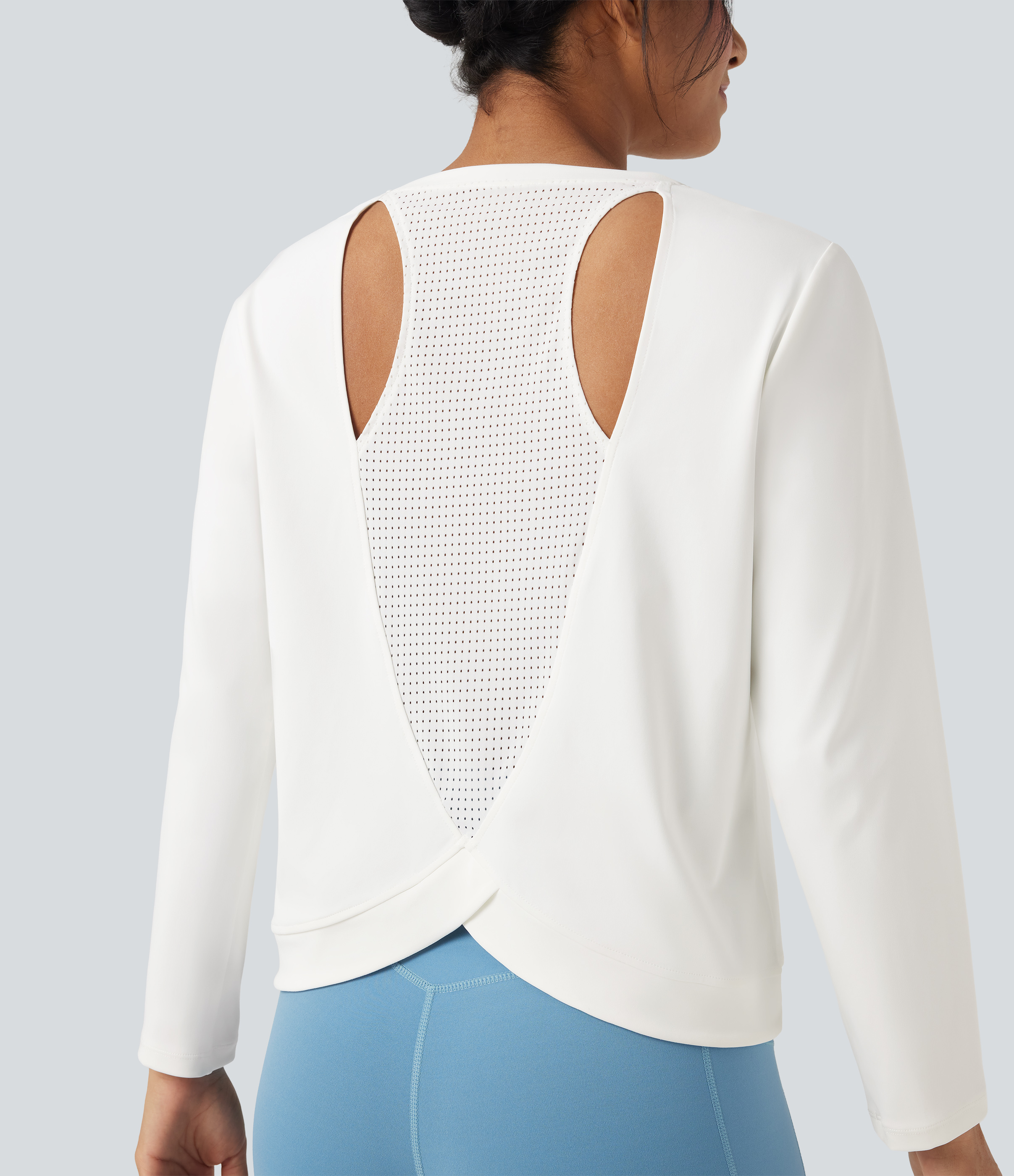 Bianco Top sportivo da corsa a manica lunga con scollo rotondo e ritagli decorativi / 1