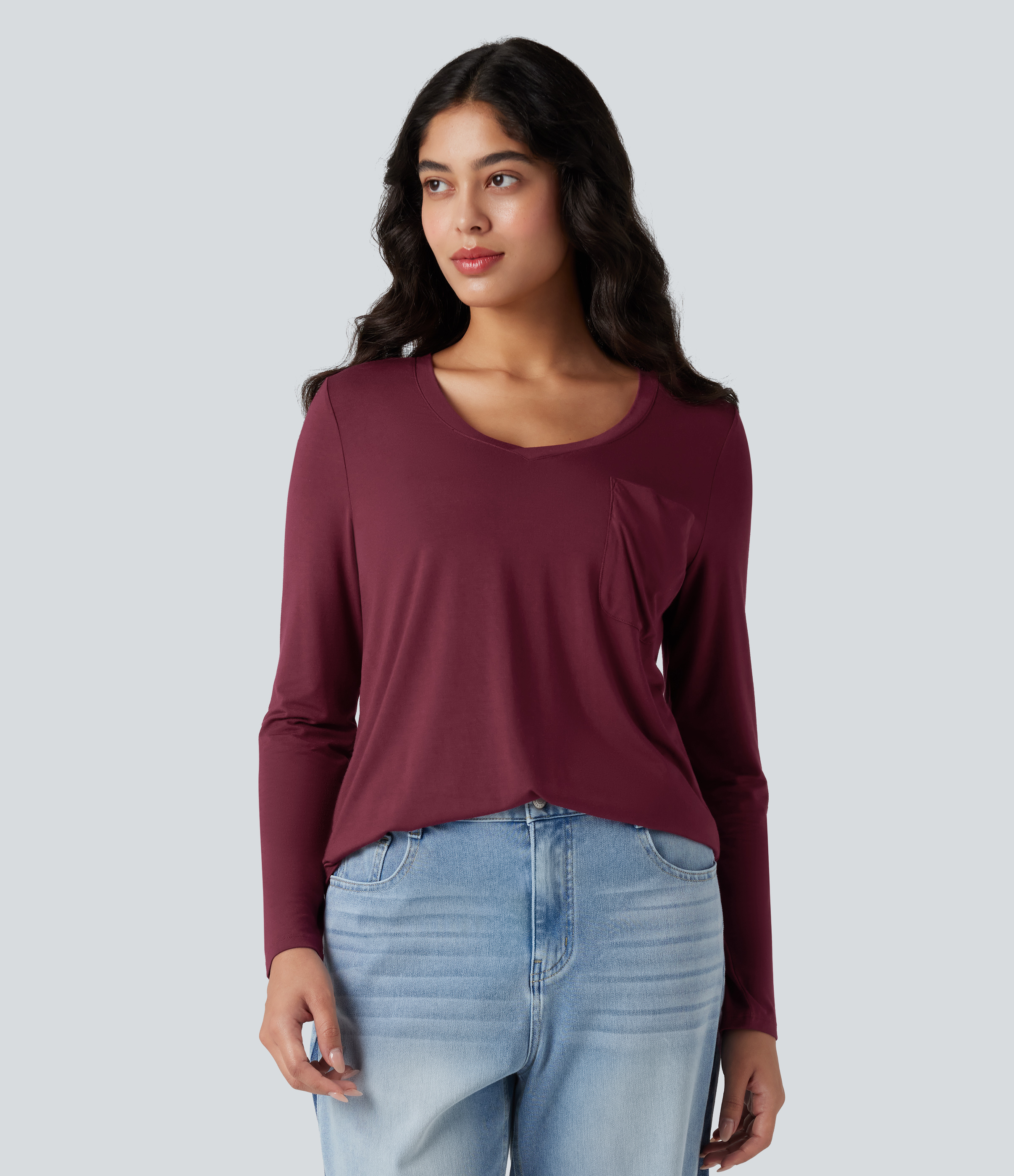 T-shirt décontracté à encolure en V, manches longues, ourlet arrondi et coupe ample, avec poche