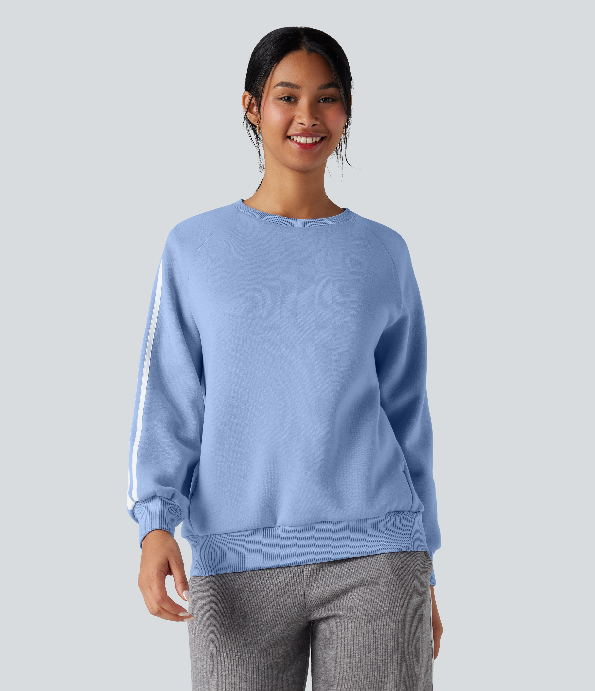 Sweat-shirt polaire color block col rond manches longues avec poches