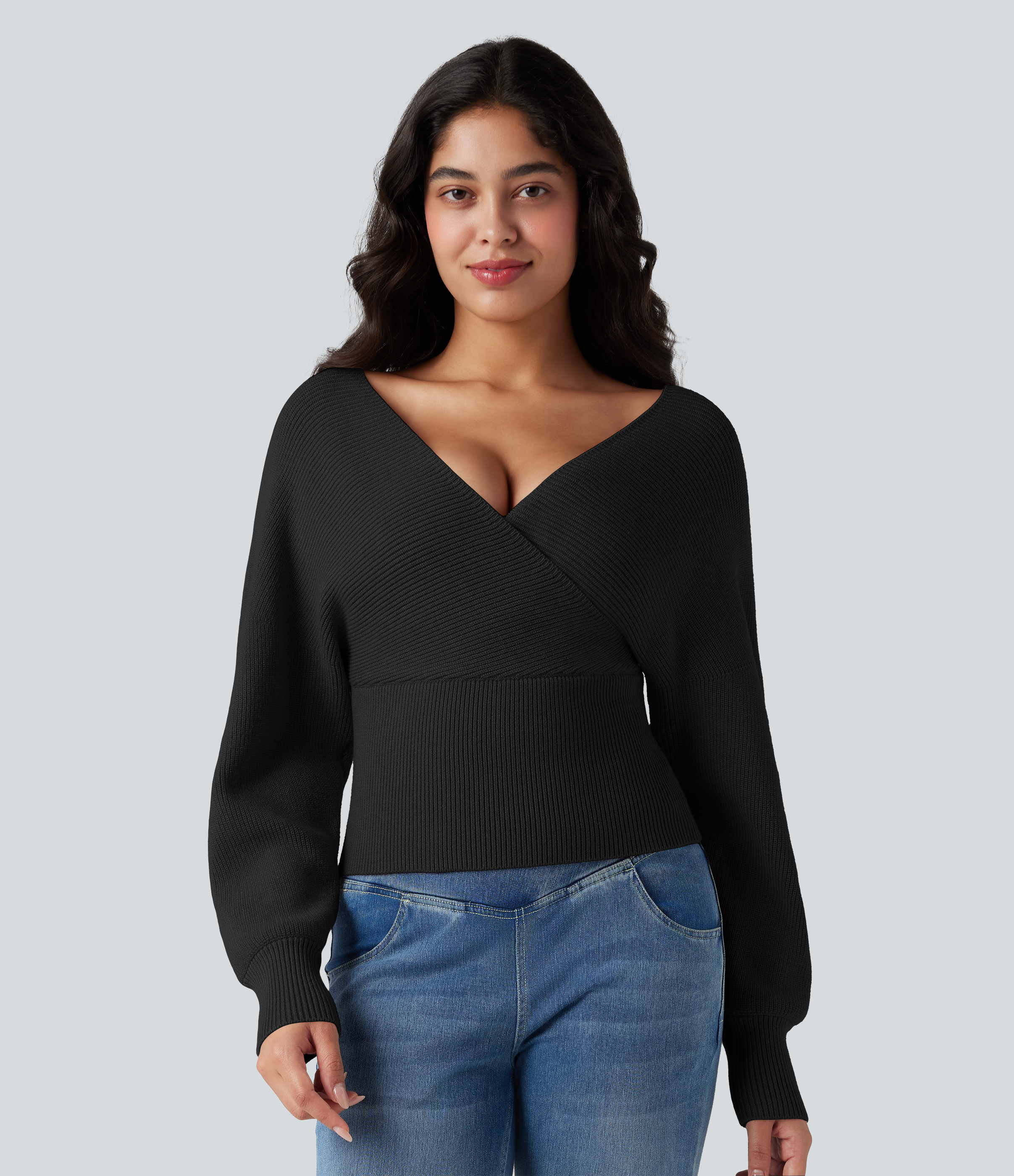 Black Lässiger Pullover mit V-Ausschnitt, Fledermausärmeln und Cut-Out-Design / 2