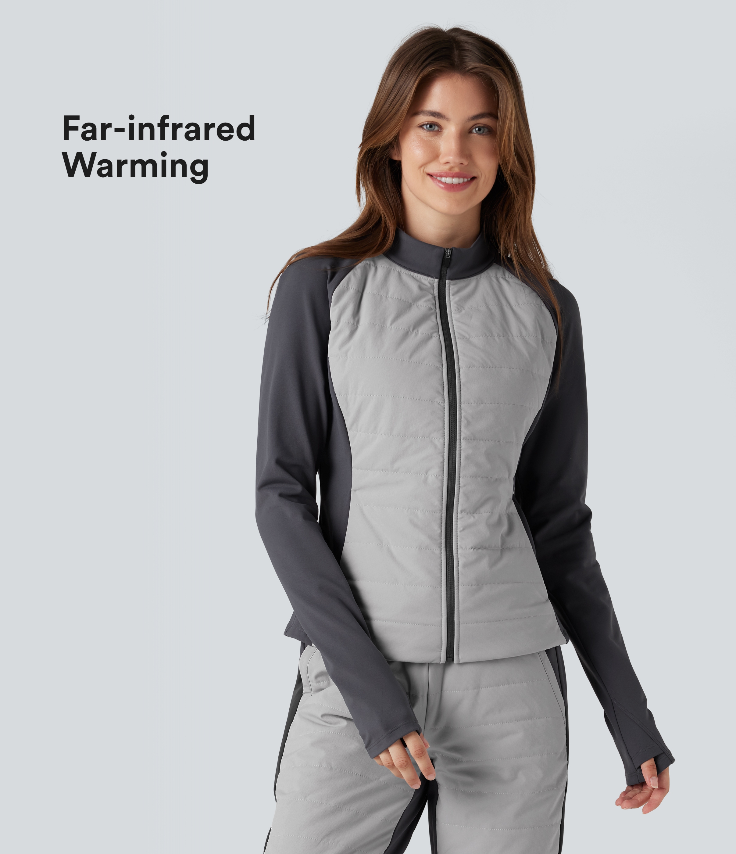 Schlanke Fleece-Steppjacke mit Stehkragen, Seitentaschen, langen Ärmeln, Daumenlöchern und Farbblock