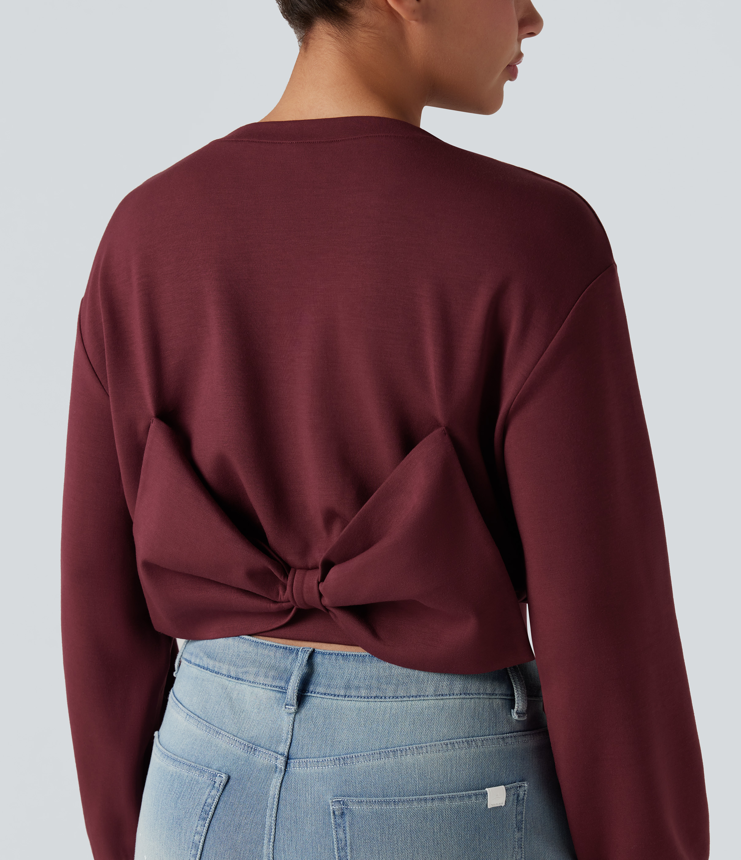 Cropped casual-sweatshirt med rund hals, lange ærmer og sløjfe bagpå