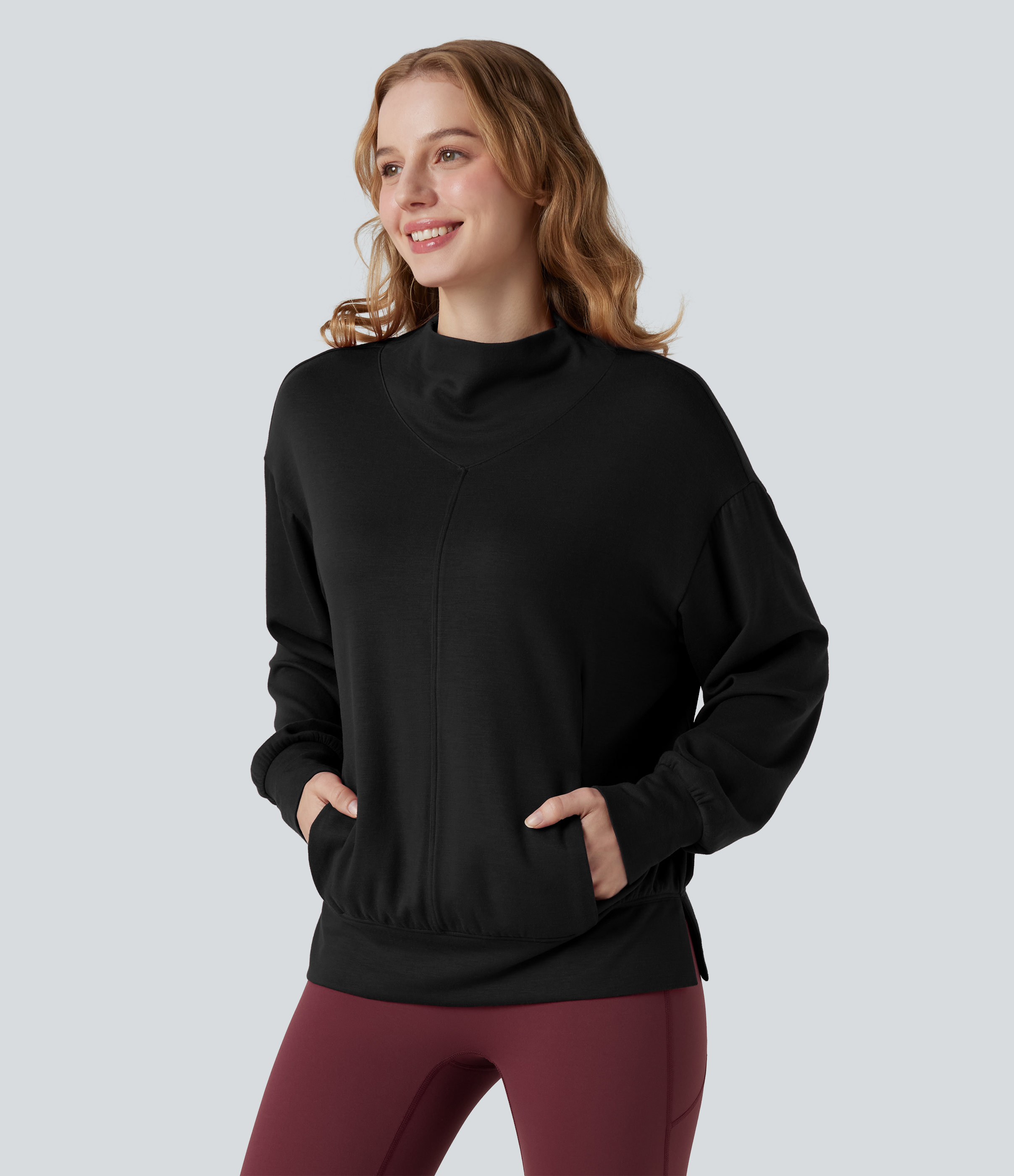 Halara HeatCore - Yoga-Sport-Top mir hohem Kragen, Taschen und langen Ärmeln - wärmend