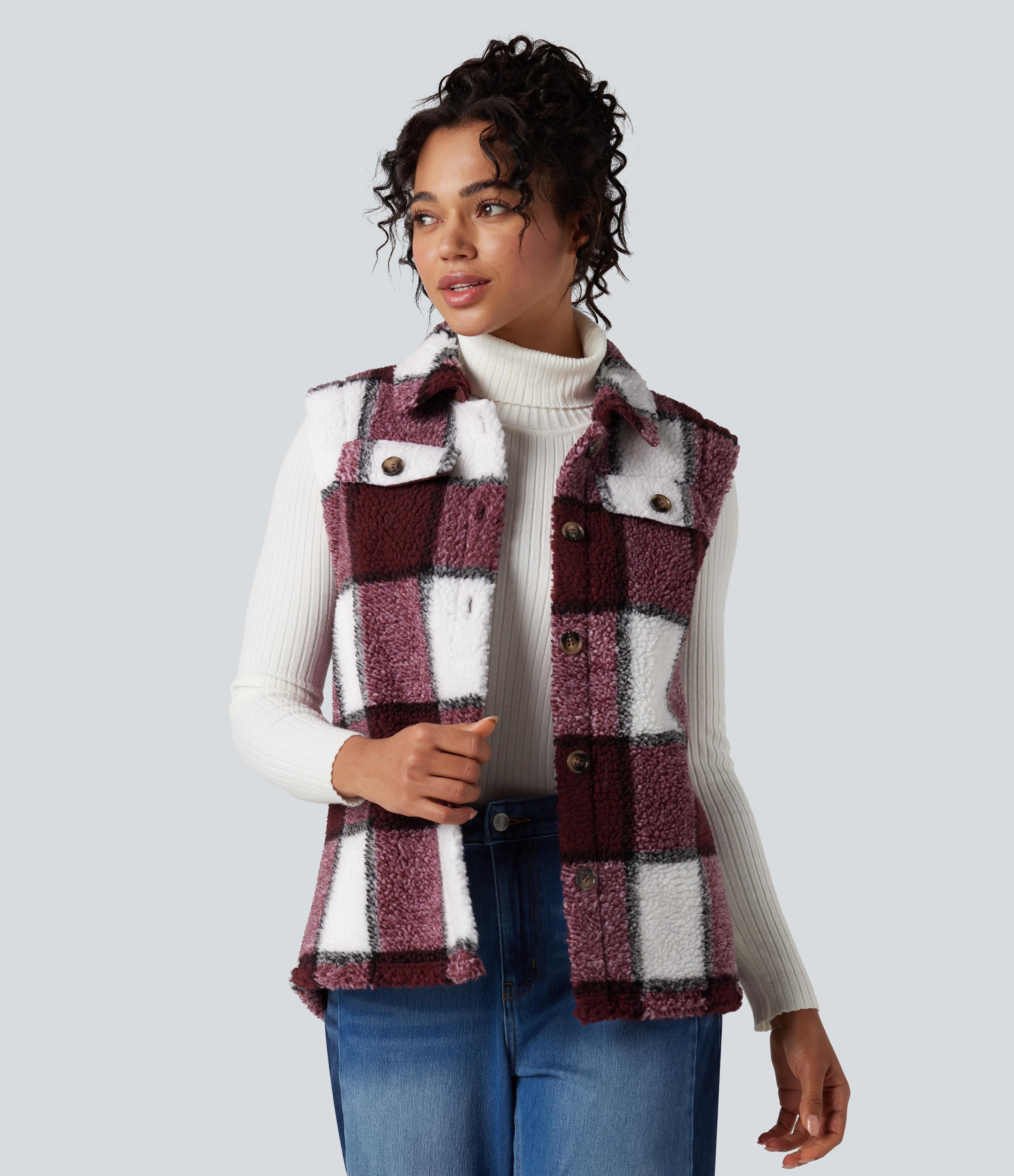 Casual sherpa vest with a check pattern and rounded hem