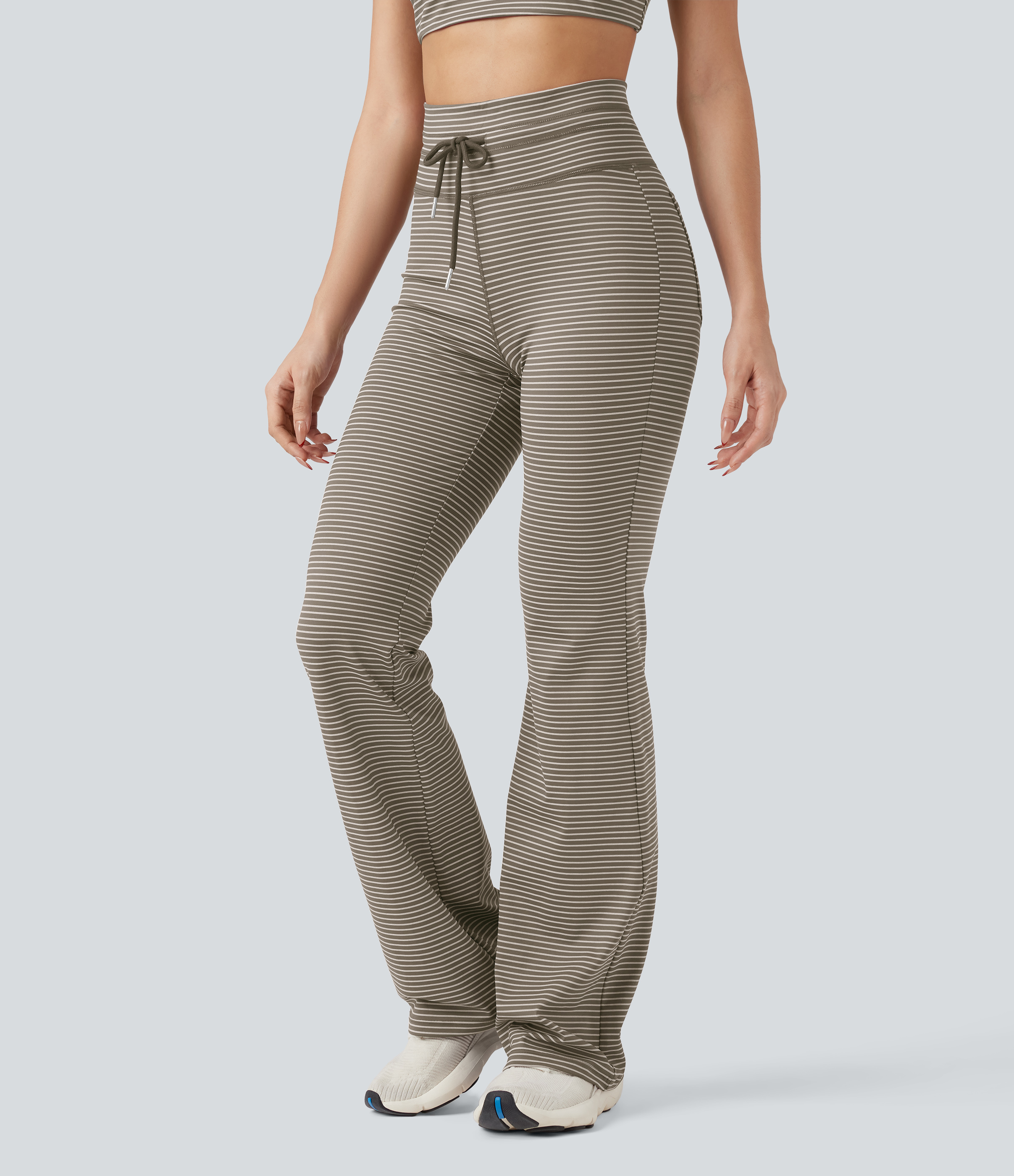 Pantalones de yoga acampanados de cintura alta con cordón y bolsillos a rayas