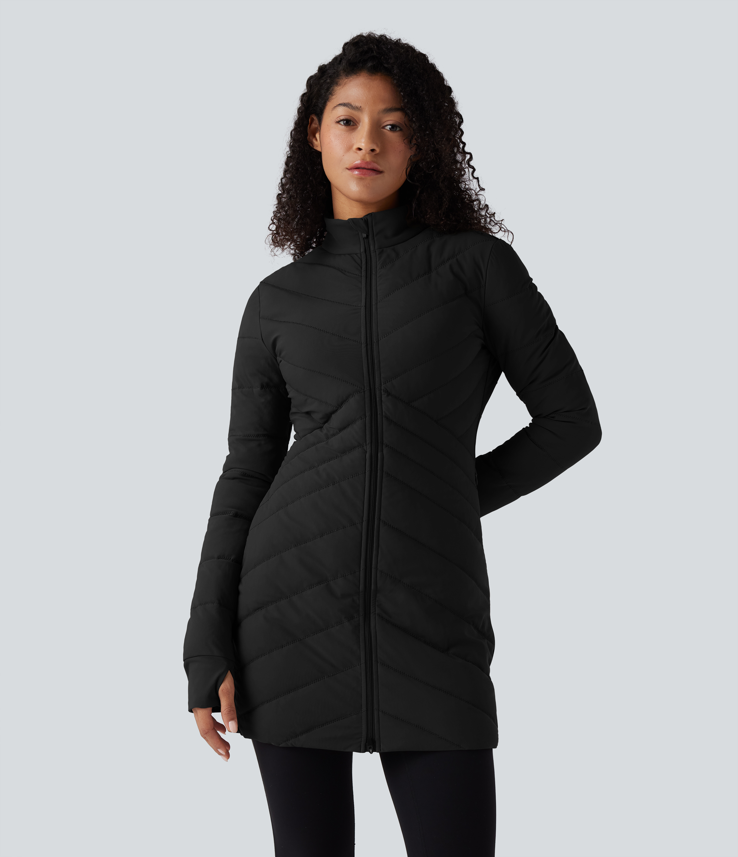 PuffFlex Stand Collar Long Sleeve Thumb Holes Zip Hem Stretchy Slim Casual Quilted Jacket with Pockets
