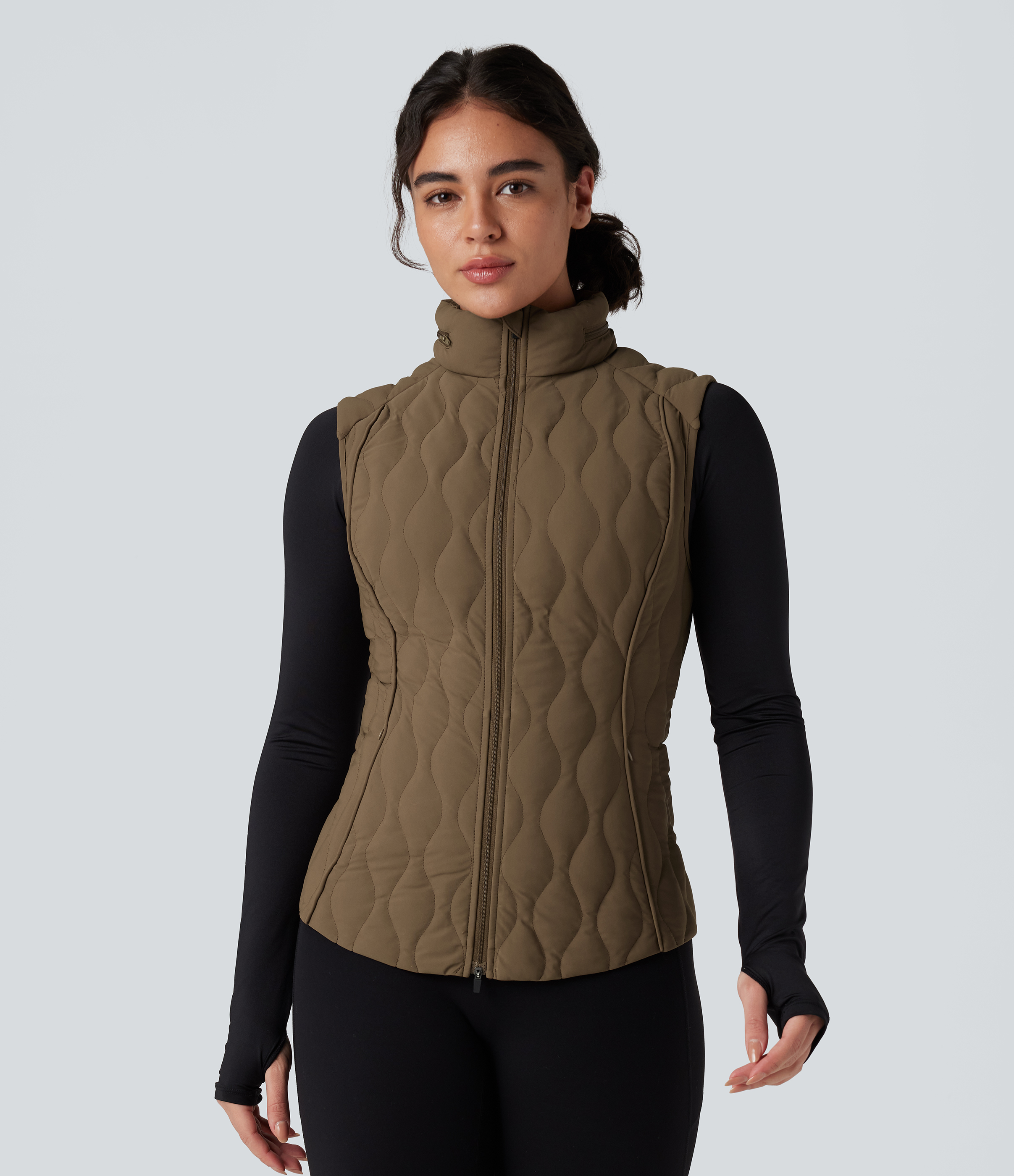 Gilet matelassé de running, col montant zippé, pliable, avec poches