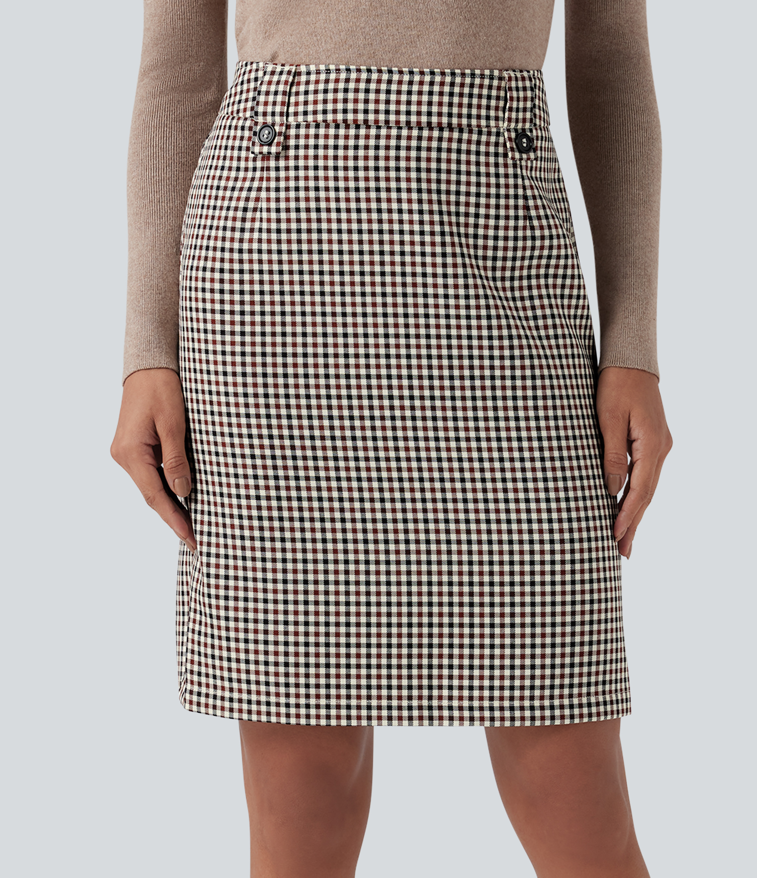 Work skirt with mid-rise waist, side pockets, zipper, check pattern and slit