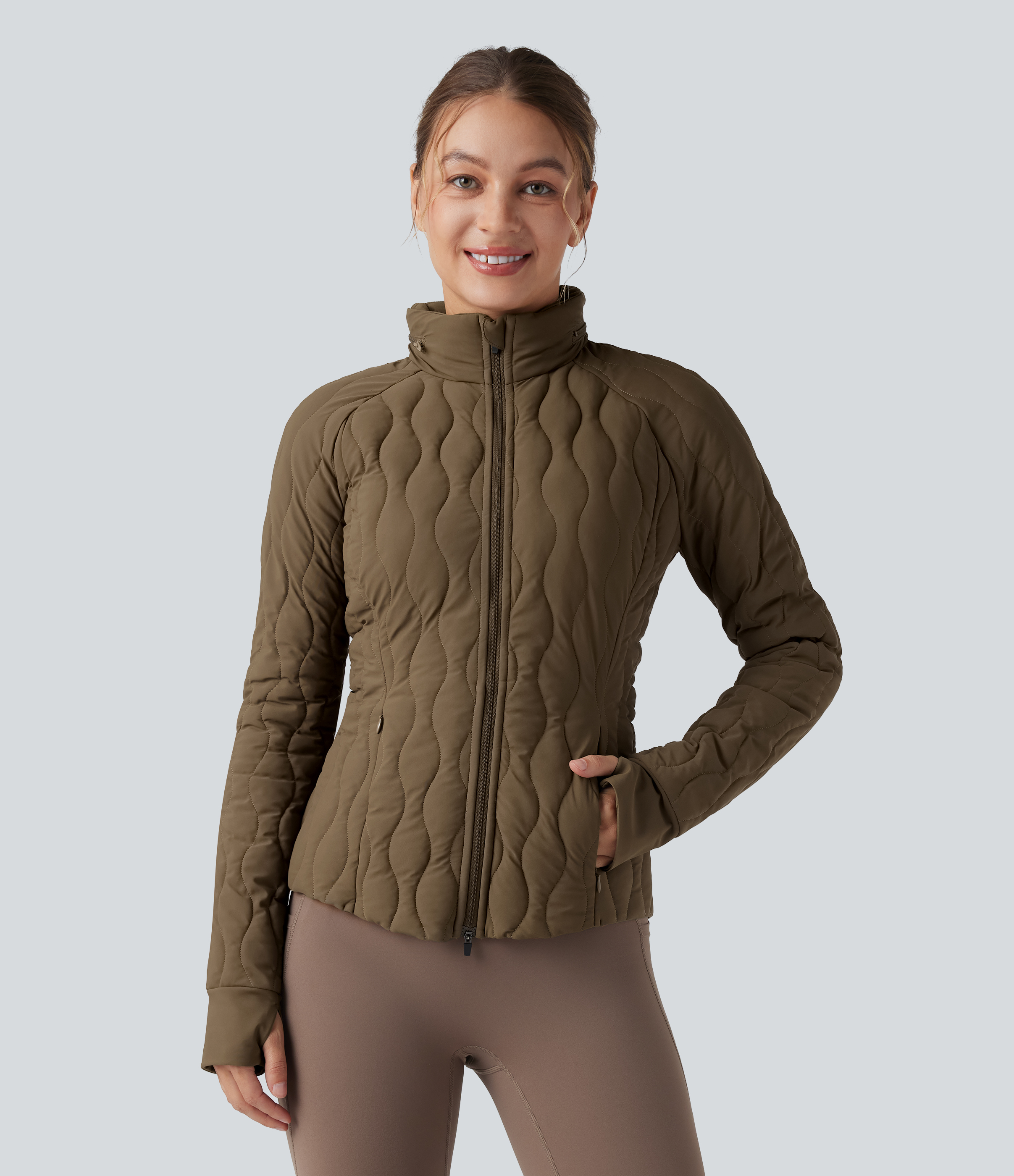 Veste de sport rembourrée et extensible PuffFlex à col montant avec passe-pouces et poches - Oreiller de cou pliable