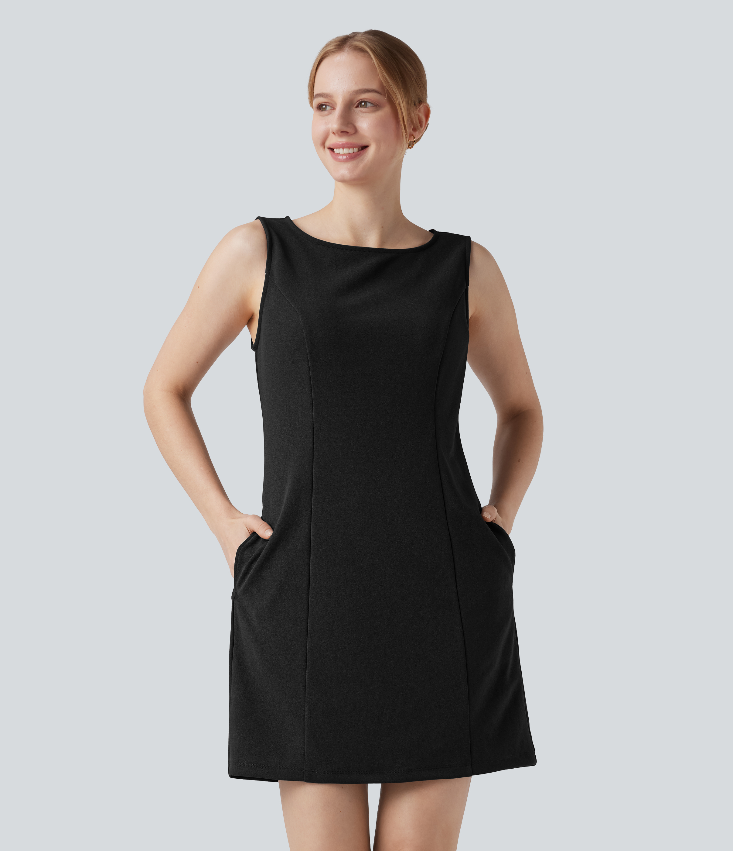 Sleeveless mini work dress with boat neck and side pockets - wrinkle-free