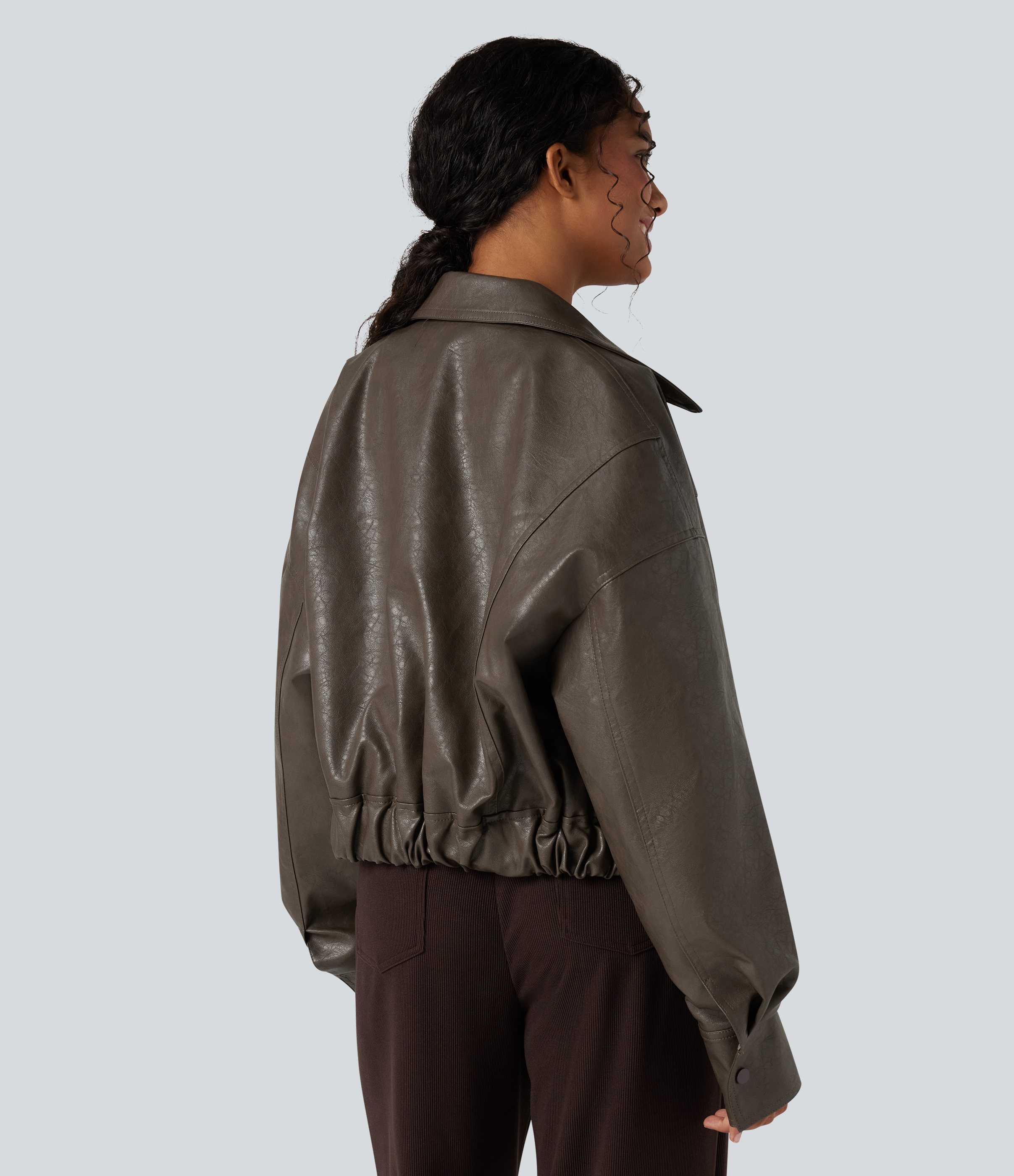 Veste décontractée en tissu enduit à fermeture éclair et manches longues avec poches