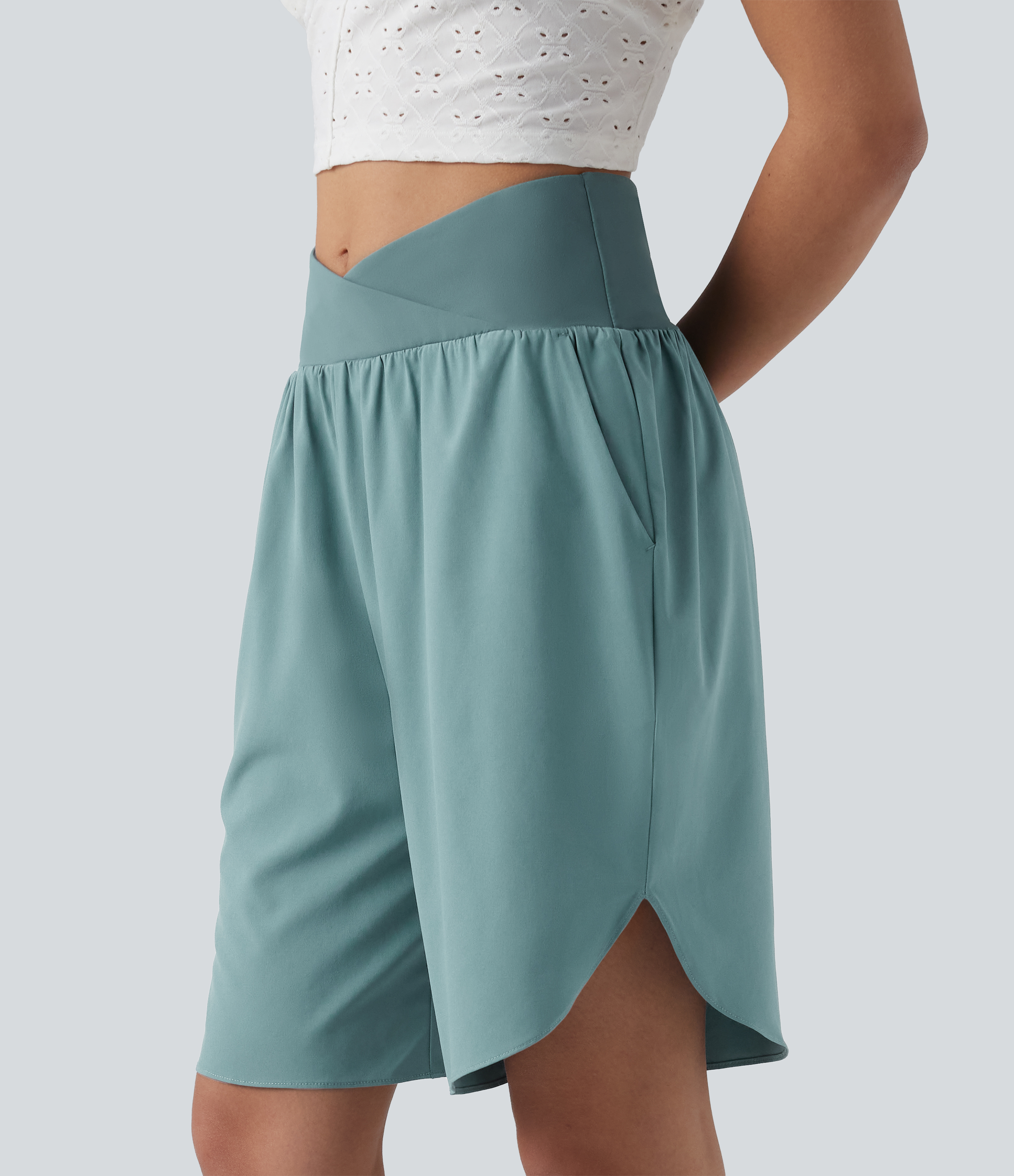 Breezeful™ High Waisted Crossover Curved Hem Quick Dry Shorts with Pockets