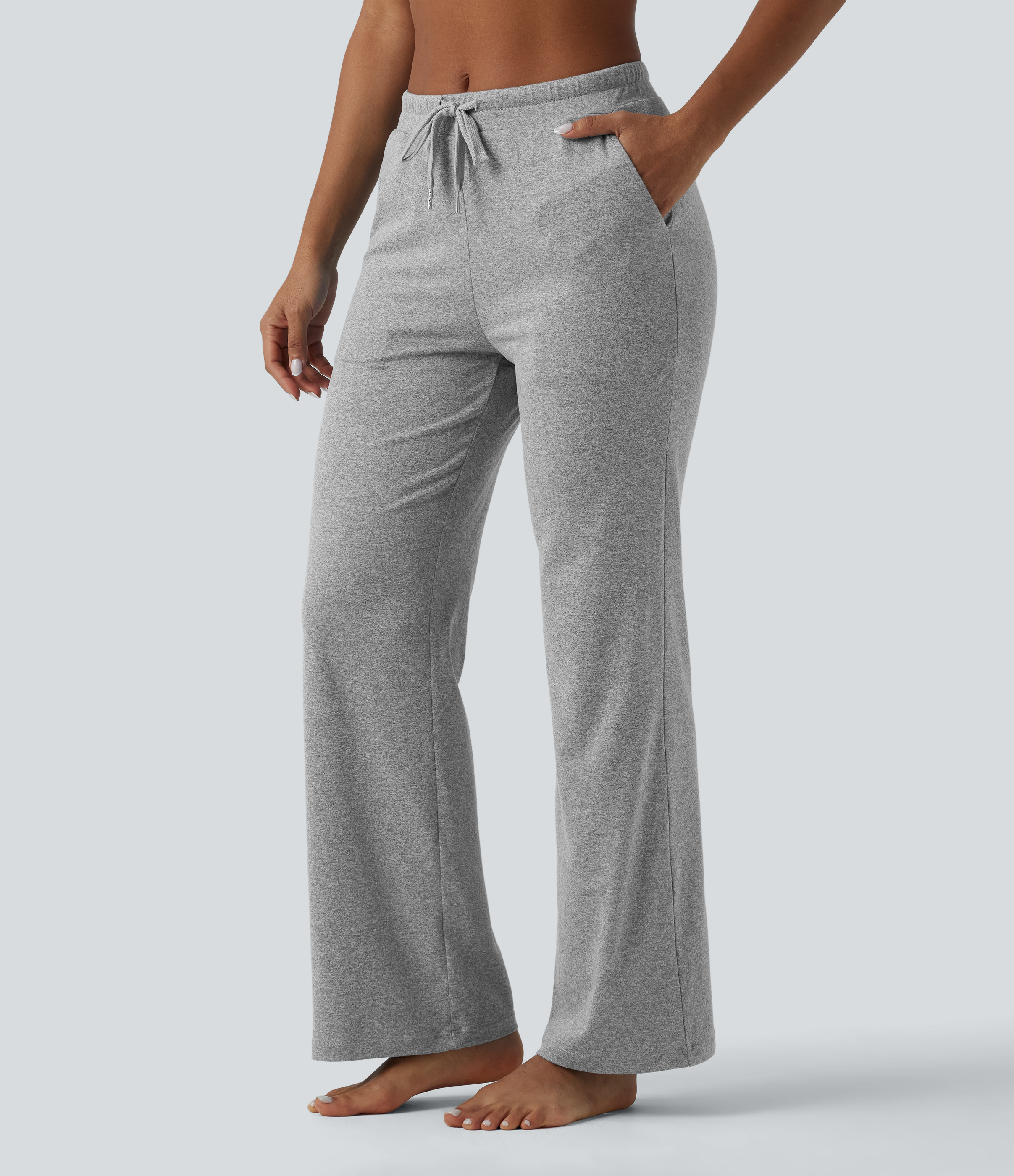 Melírozott bootcut jóga nadrág, középmagas derekú, zsinóros, ráncolt, zsebekkel.