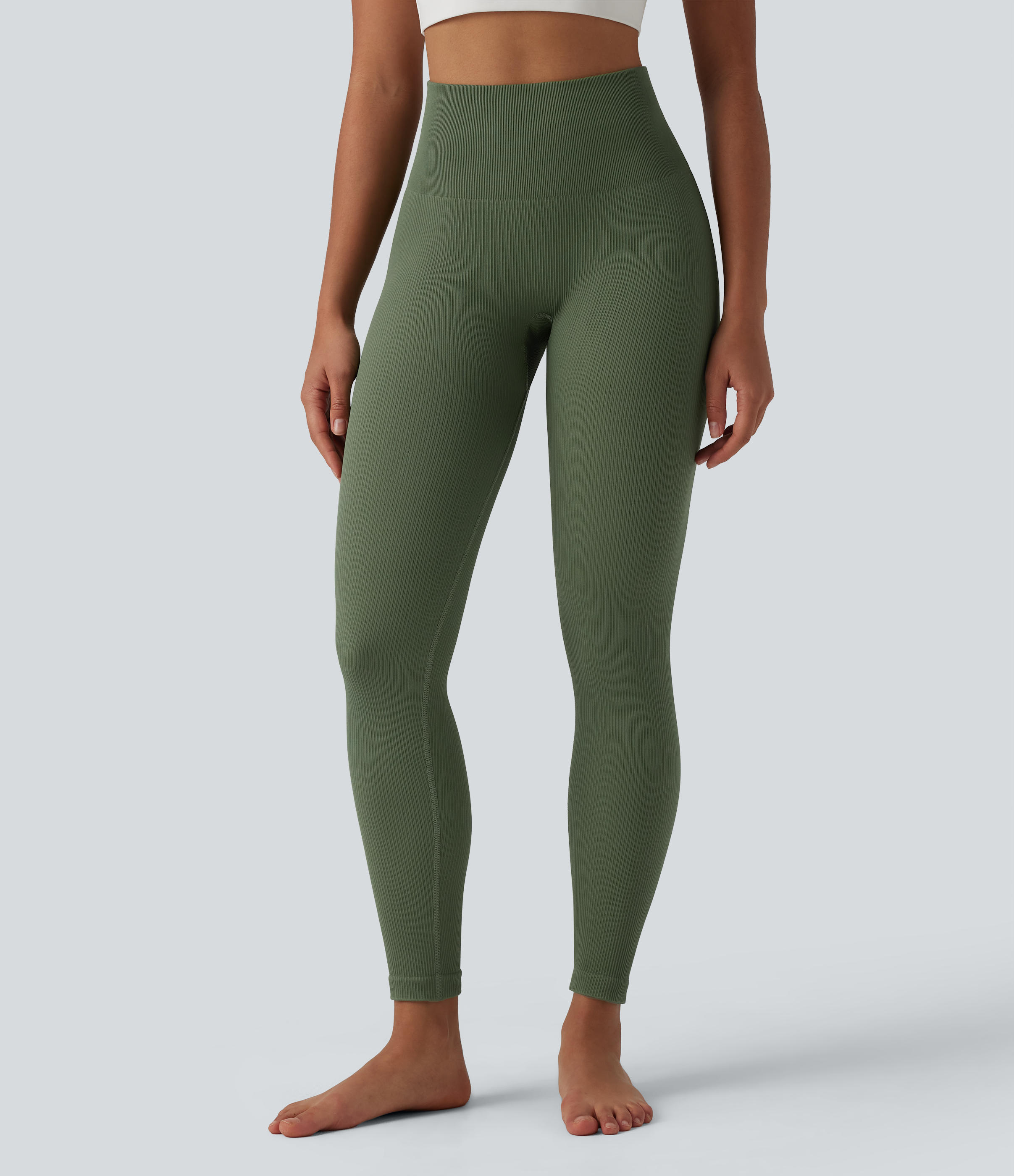 Summer Bamboo Green Booty-lifting 7/8 yoga leggings with a high-rise waistband, tummy control, and a seamless fit for effortless movement. / 2