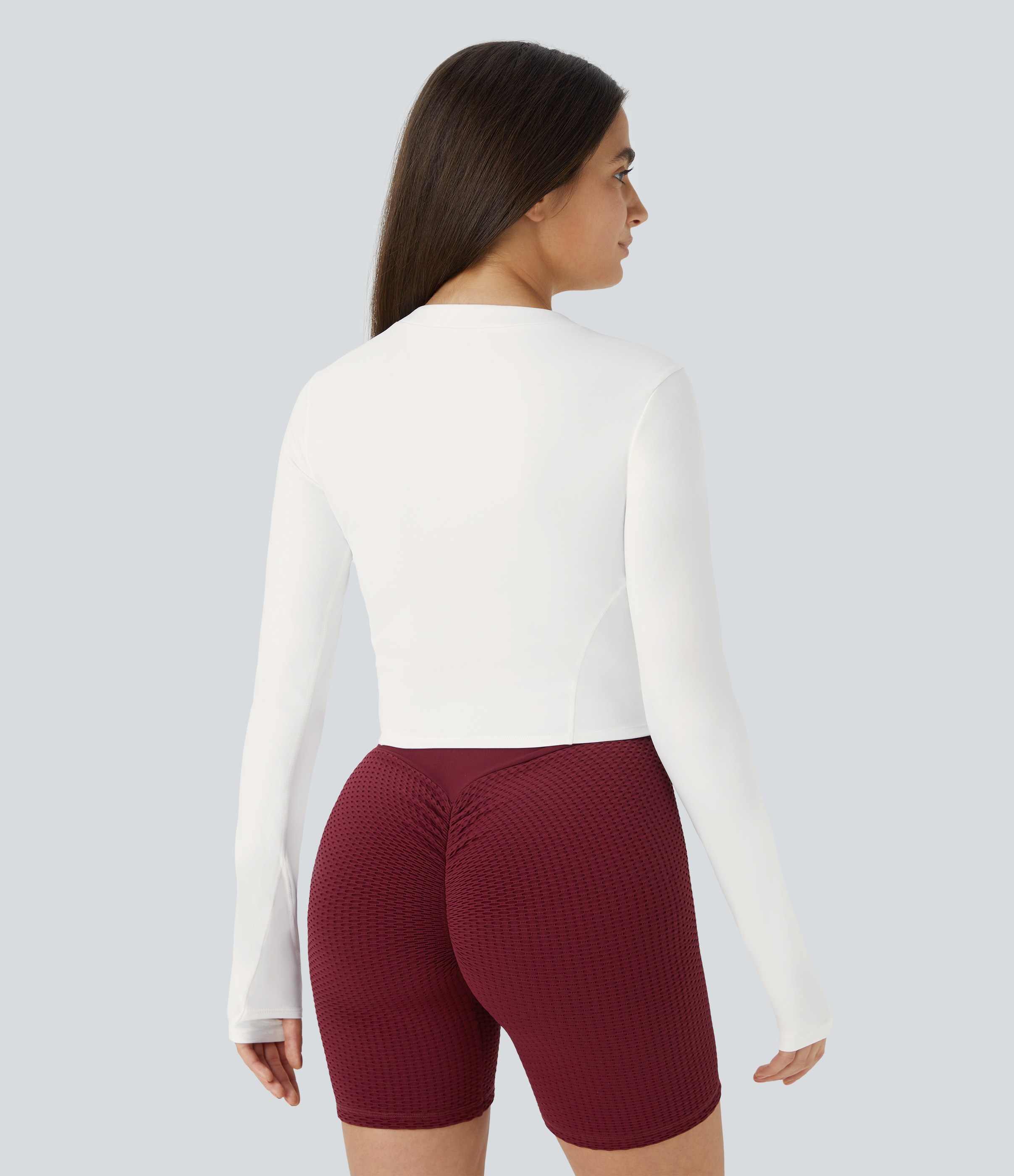 Blanco Softlyzero™ Plush Sports Top deportivo golf manga larga media cremallera ojal para pulgar / 2