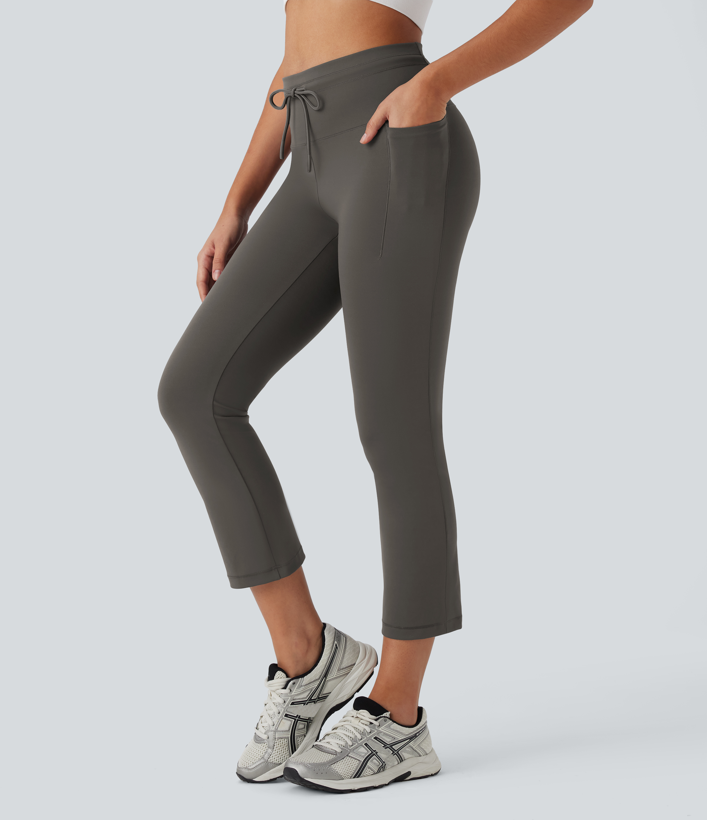 Pantalones de yoga ajustados de tiro alto con cordón y bolsillos laterales