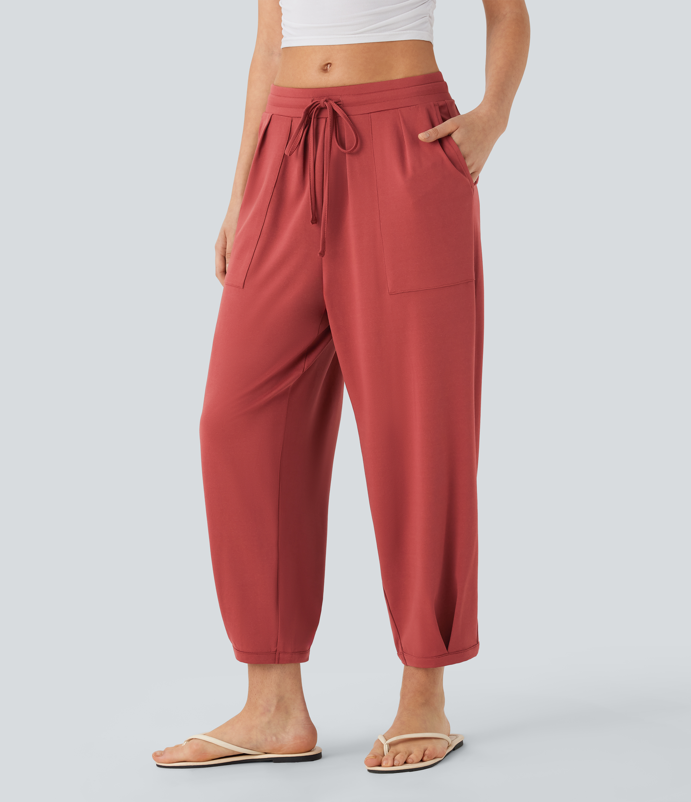Pantalones casuales ajustados de tiro medio con cordón y bolsillos