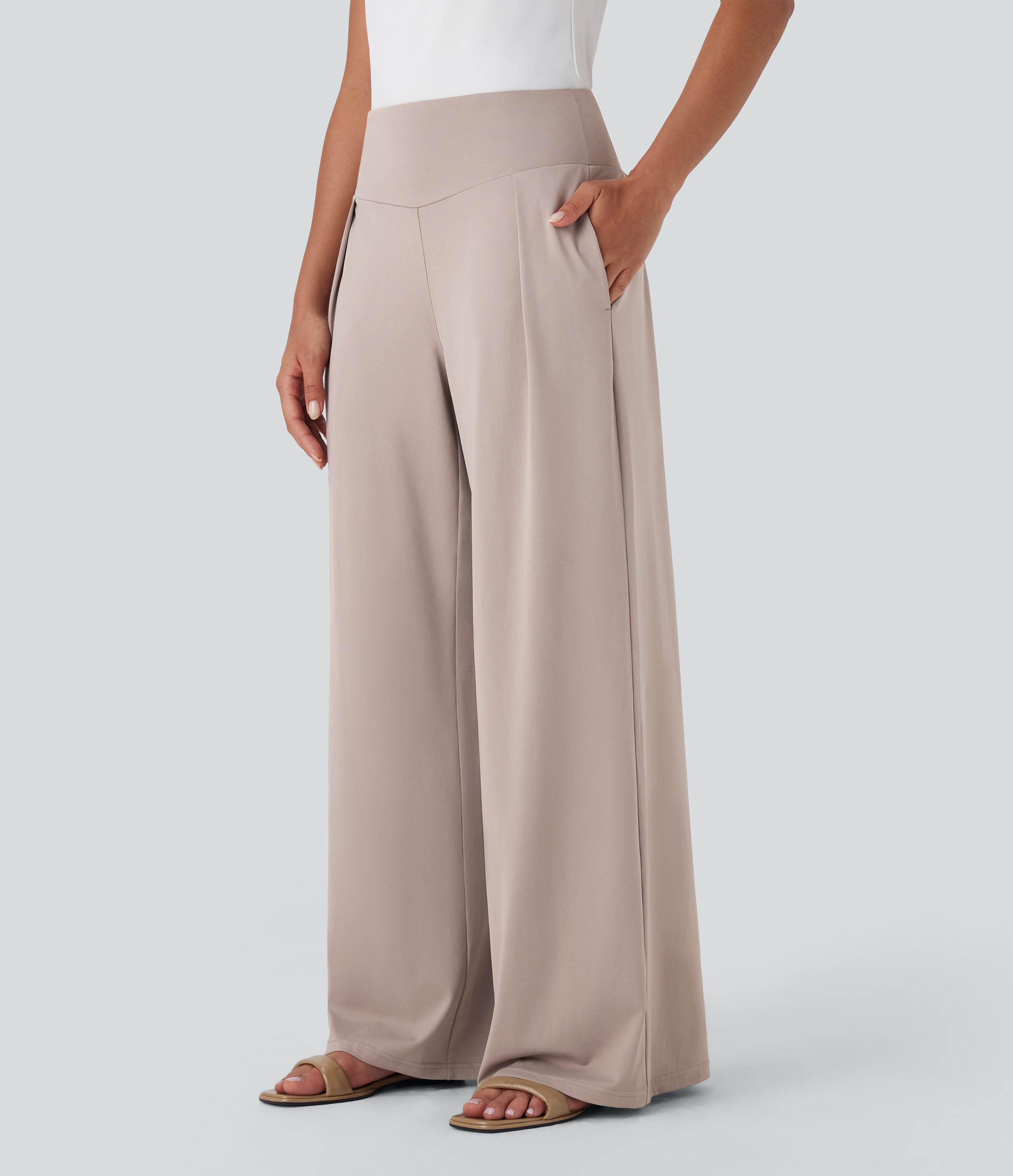 Pantalon large fluide taille haute avec poches latérales