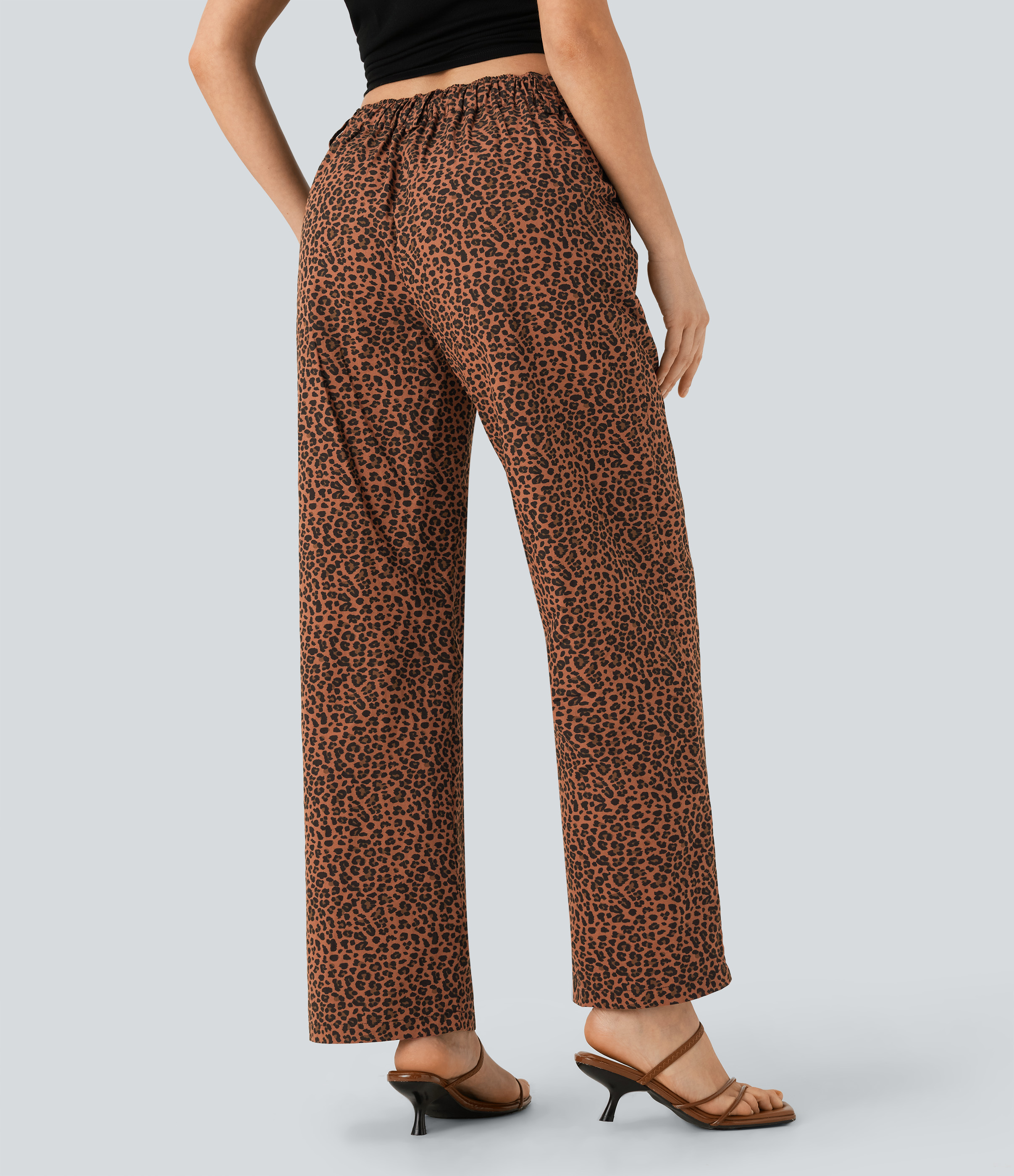 Black Coffee Leopard Print Casual cotton pants with a mid-rise waist, side pockets, leopard print, and a straight-leg cut. / 2
