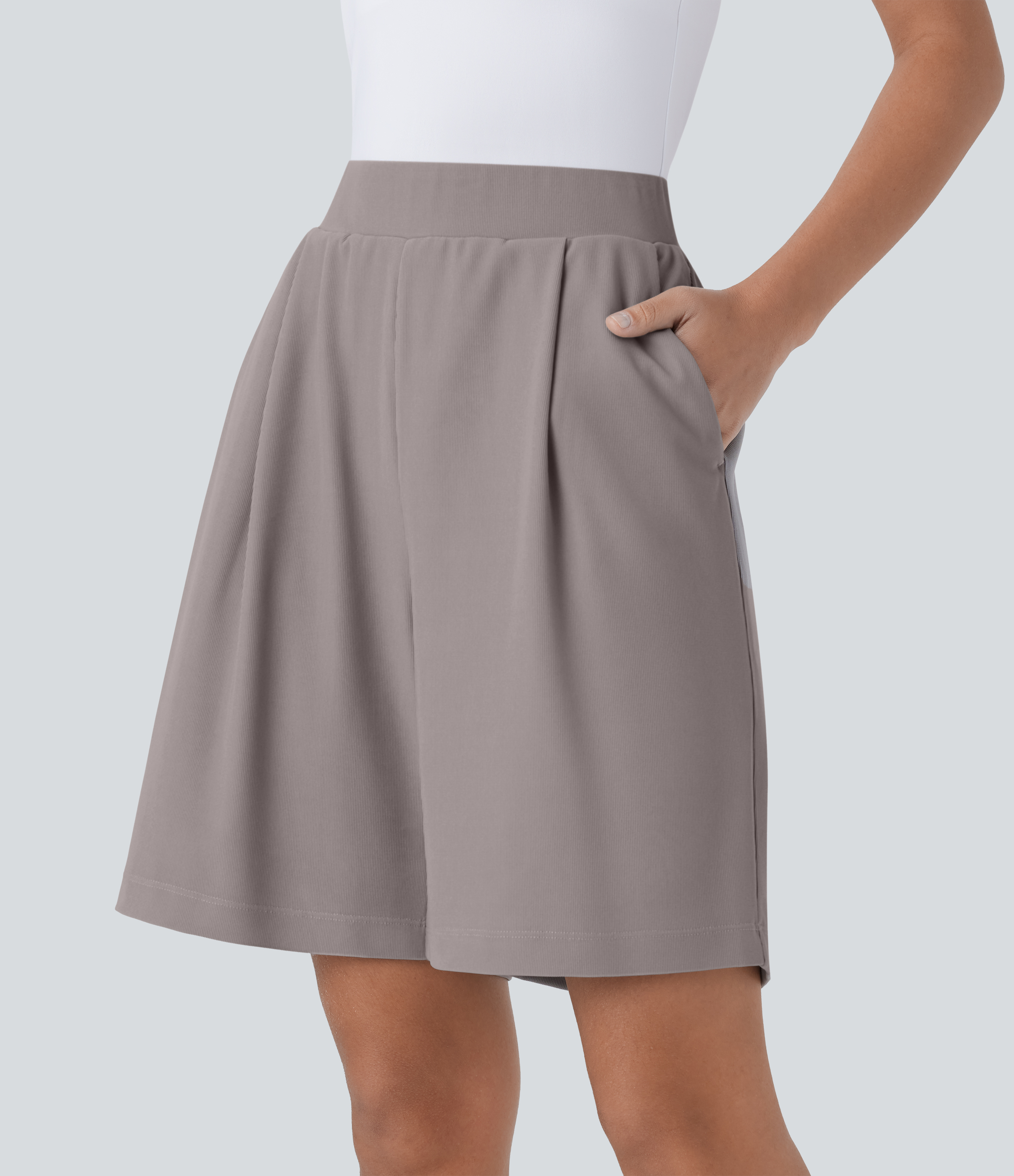 Bermudas de trabajo de talle alto, moldeadoras y que afinan la cintura, con bolsillos y tejido micro‑waffle.