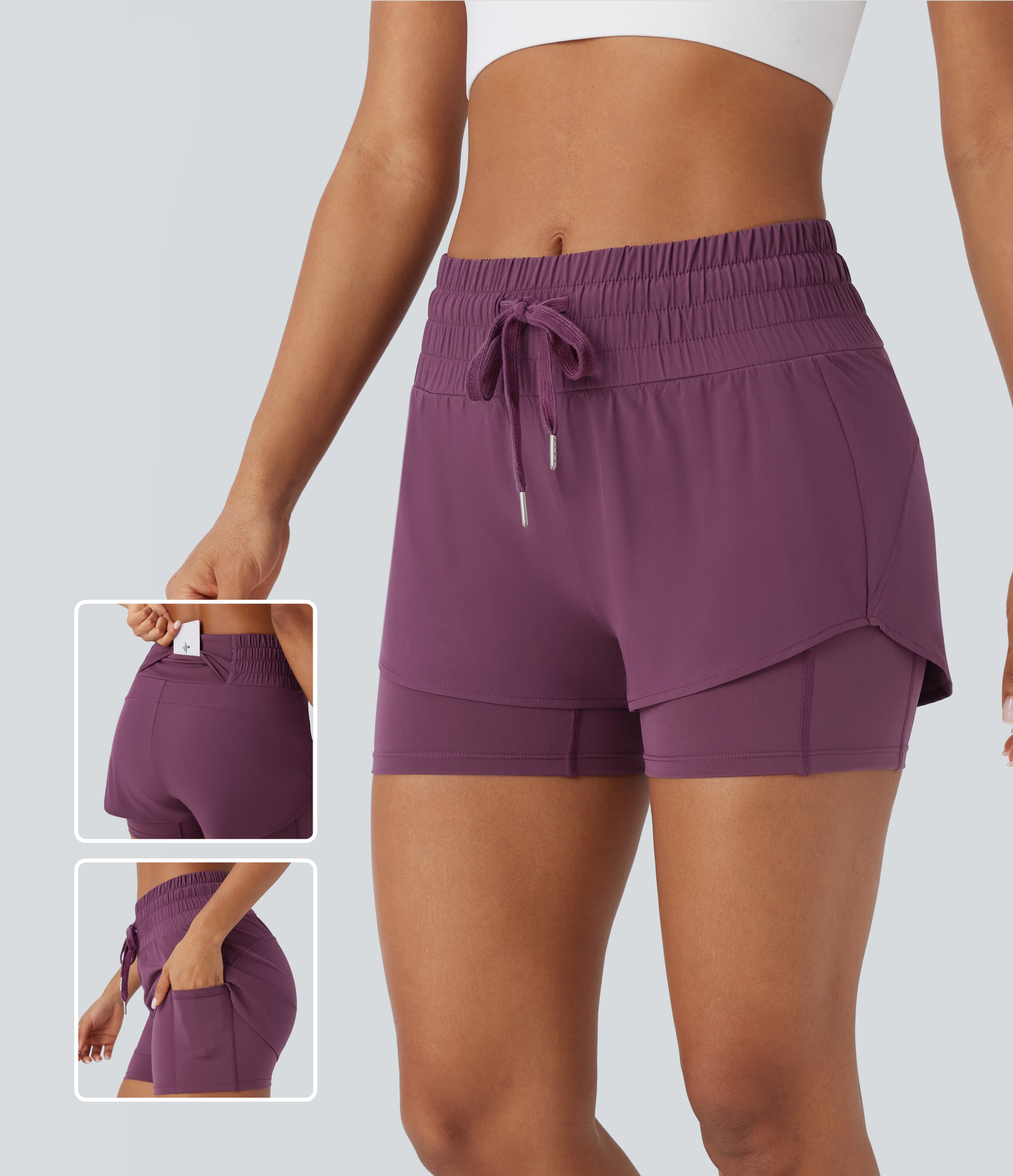 Amaranth Breezeful™ short de running taille mi-haute avec cordon de serrage à la taille, poches, conception 2-en-1, ourlet incurvé et tissu à séchage rapide. / 1