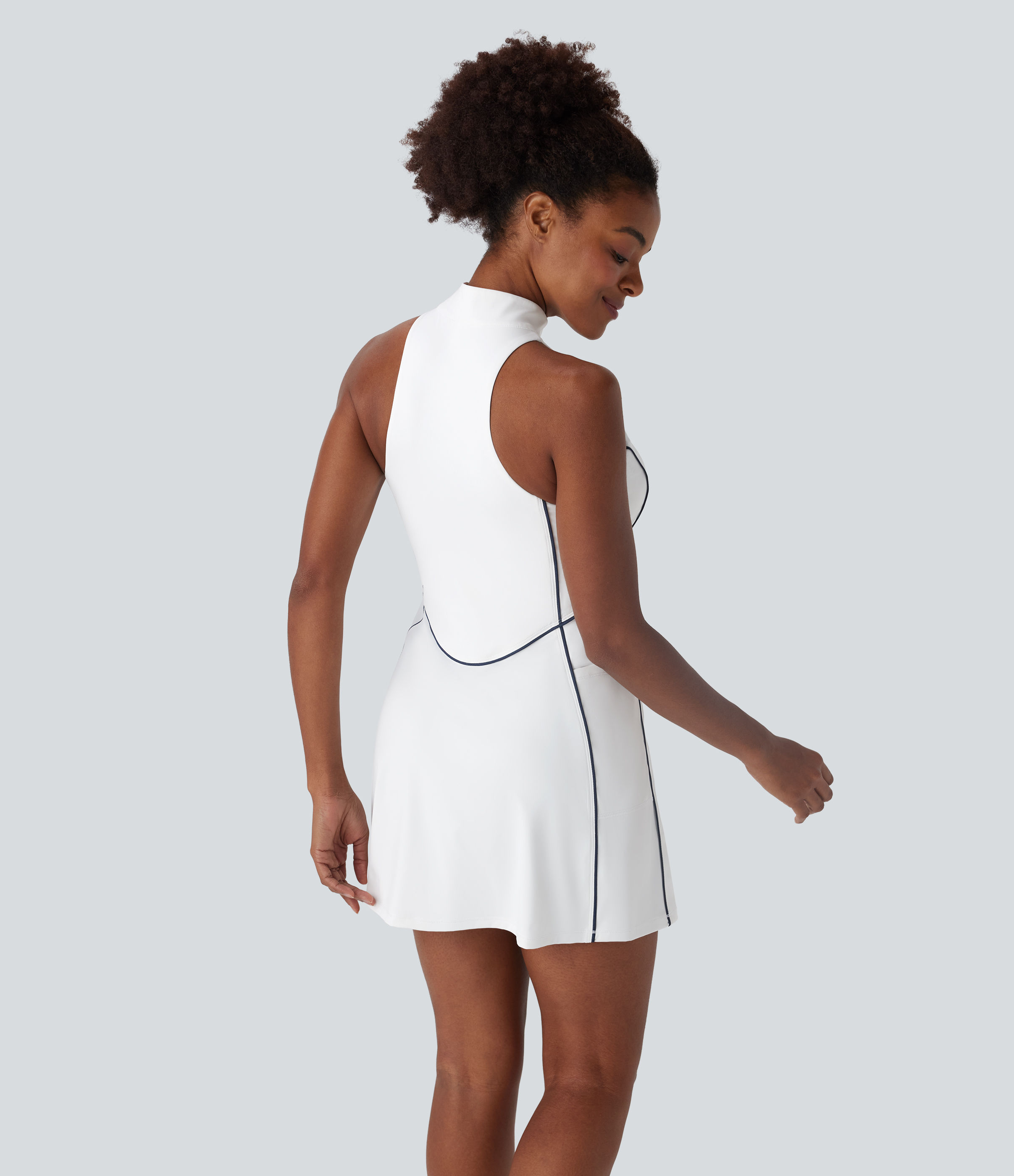 White Softlyzero™ QuickDry sleeveless mini active golf dress with half-zip and side pockets – Golf Tee / 2