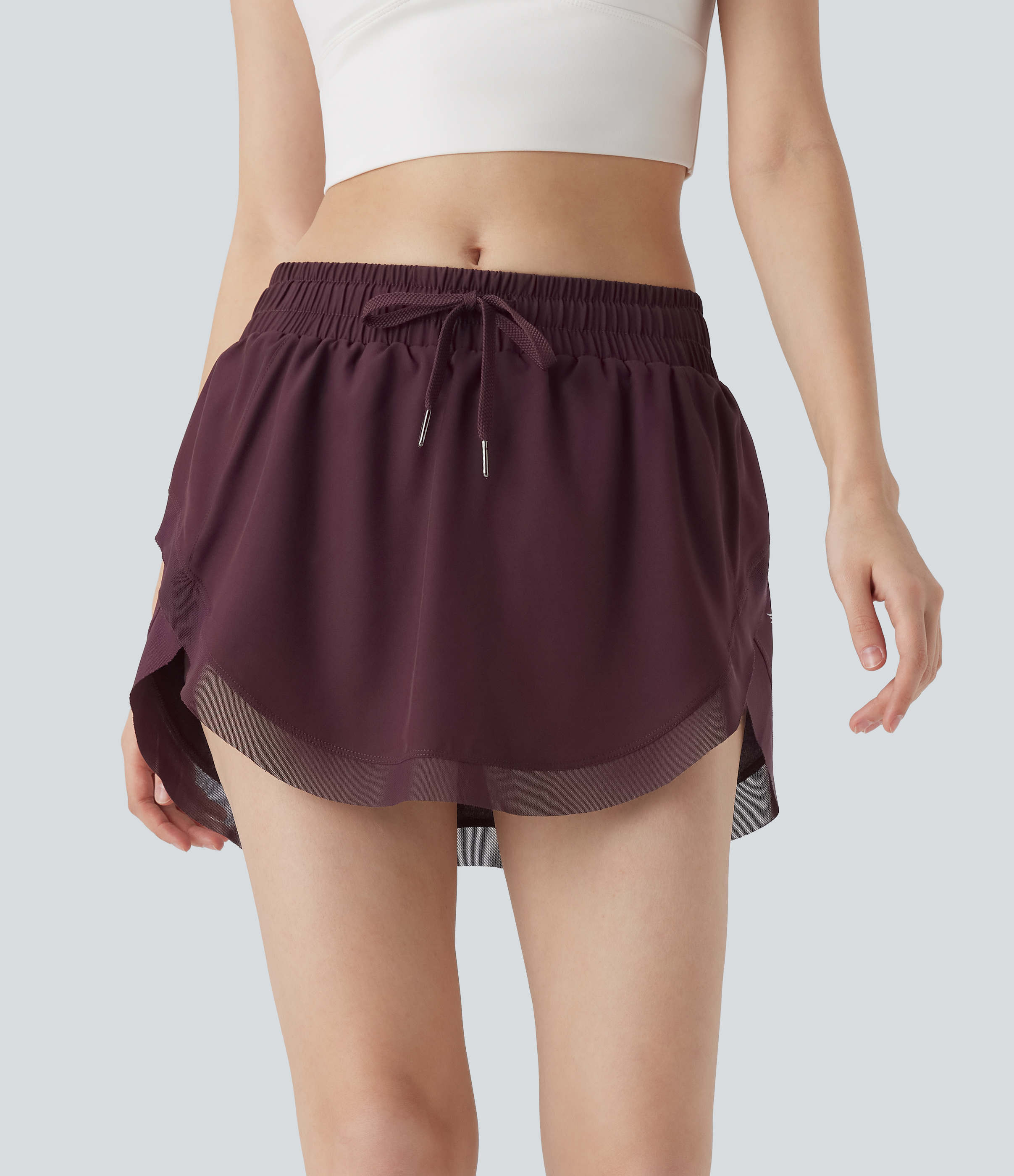 Halara – 2-in-1 Tennis-Minirock mit mittelhohem Bund, Seitentaschen, Kordelzug und kontrastierendem Netzstoff – Mauve Wine – M