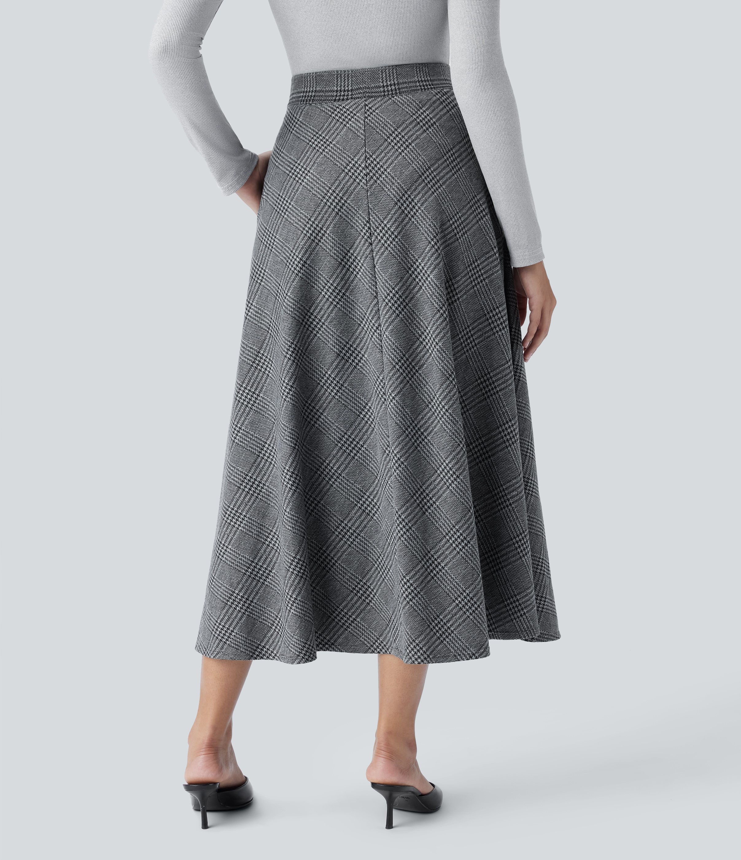 Dark Gray Plaid Casual midi skirt with a flared hem, houndstooth pattern, and a side pocket. / 2