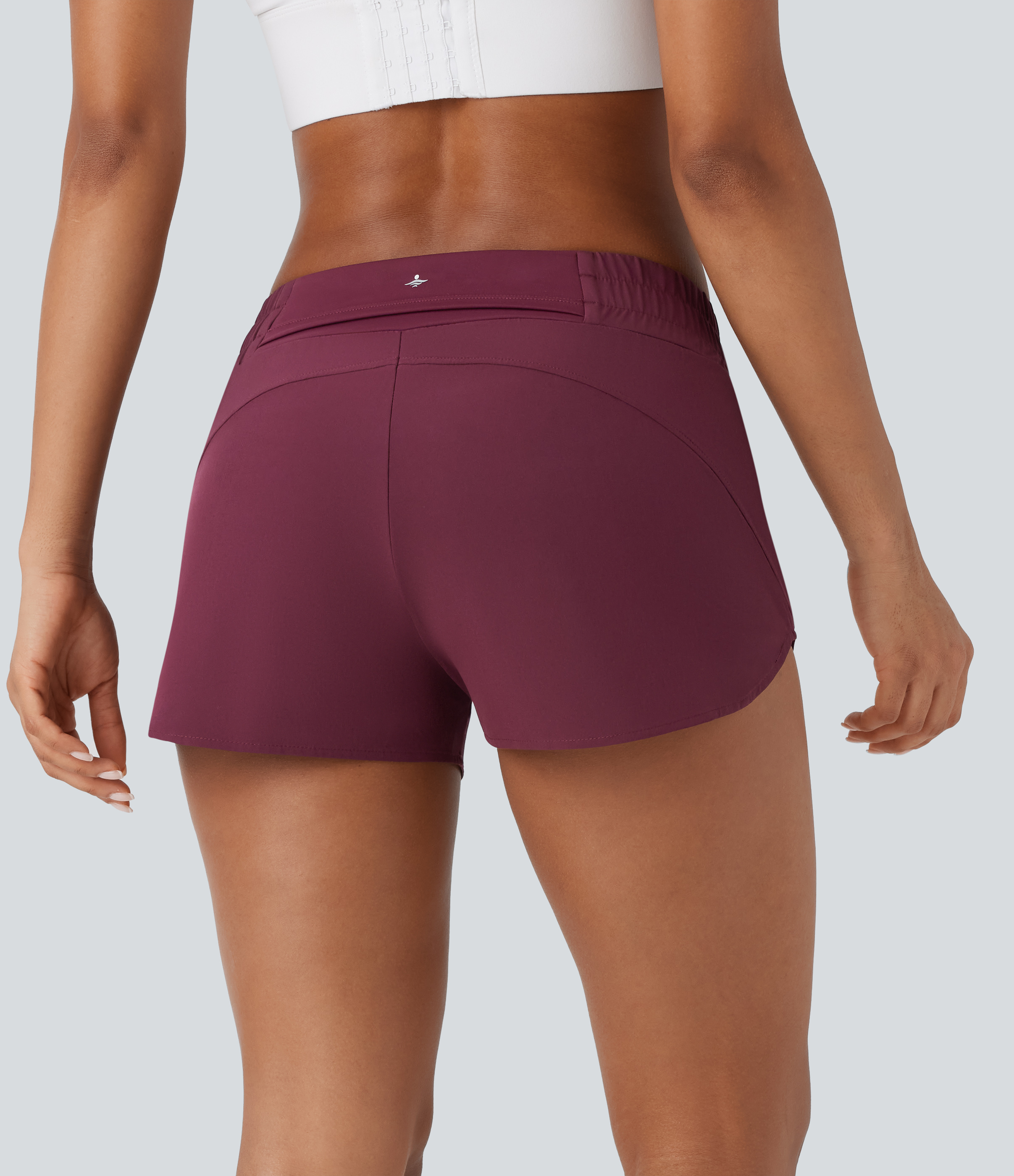 Amaranth Breezeful™ Taille basse, avec poches, 2-en-1 à ourlet arrondi et short de course à séchage rapide 2,5'' / 2