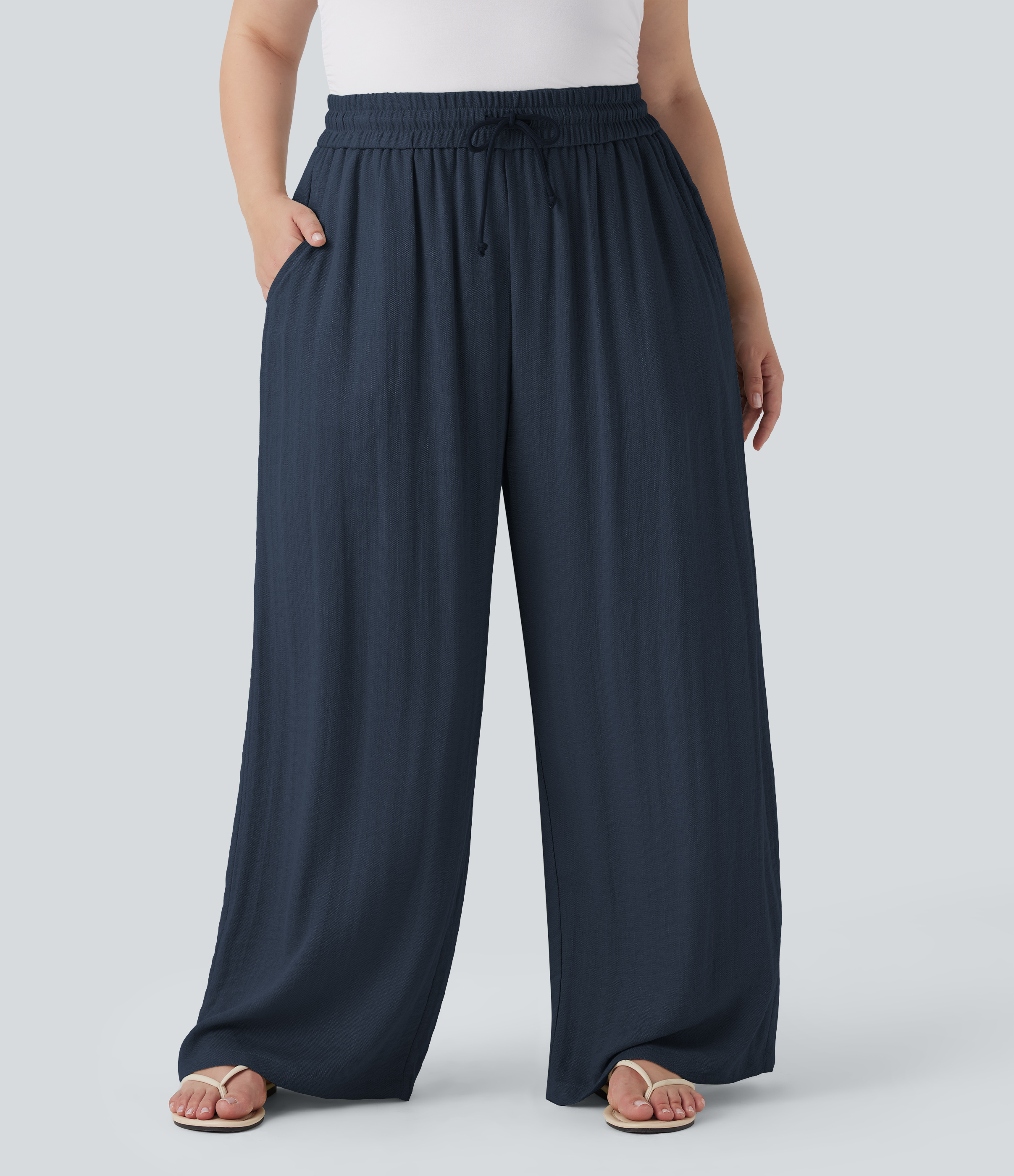 Pantalon décontracté grande taille large fluide taille haute effet lin avec cordon de serrage et poches
