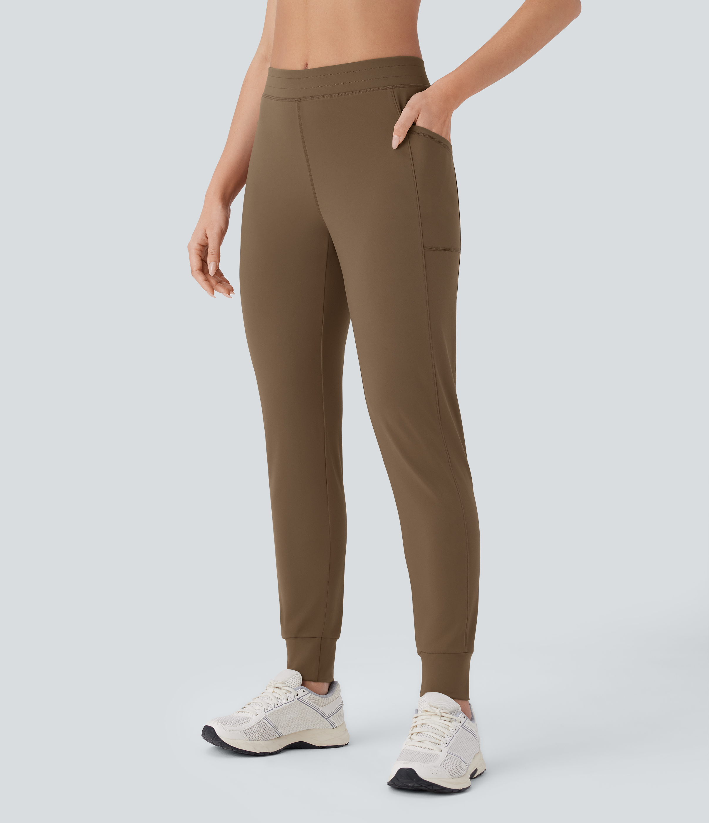 Pantalón  yoga ajustado bolsillo lateral tiro medio