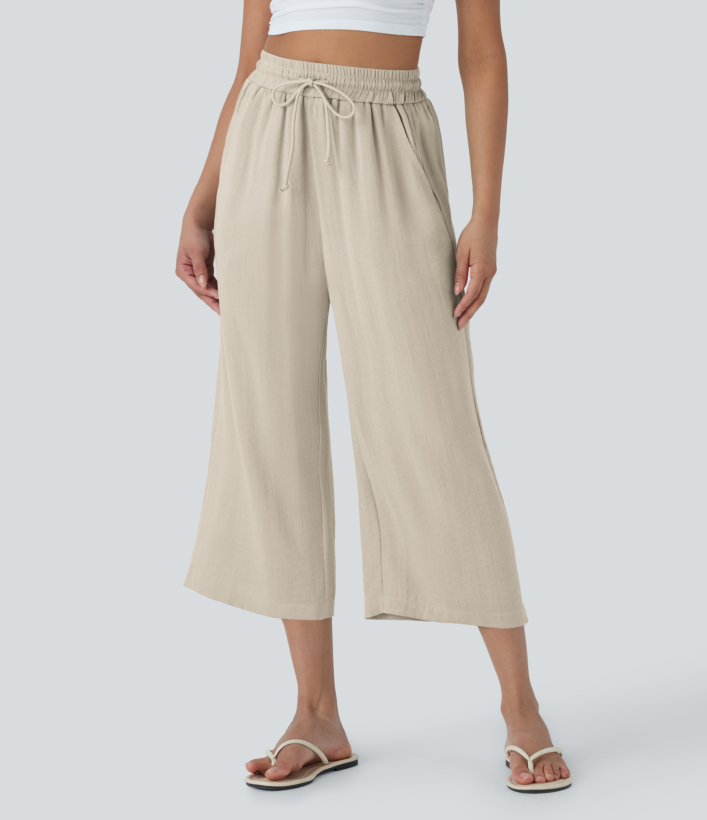 Pantalon décontracté aspect lin 7/8 à taille haute, jambe large avec cordon de serrage et poches latérales