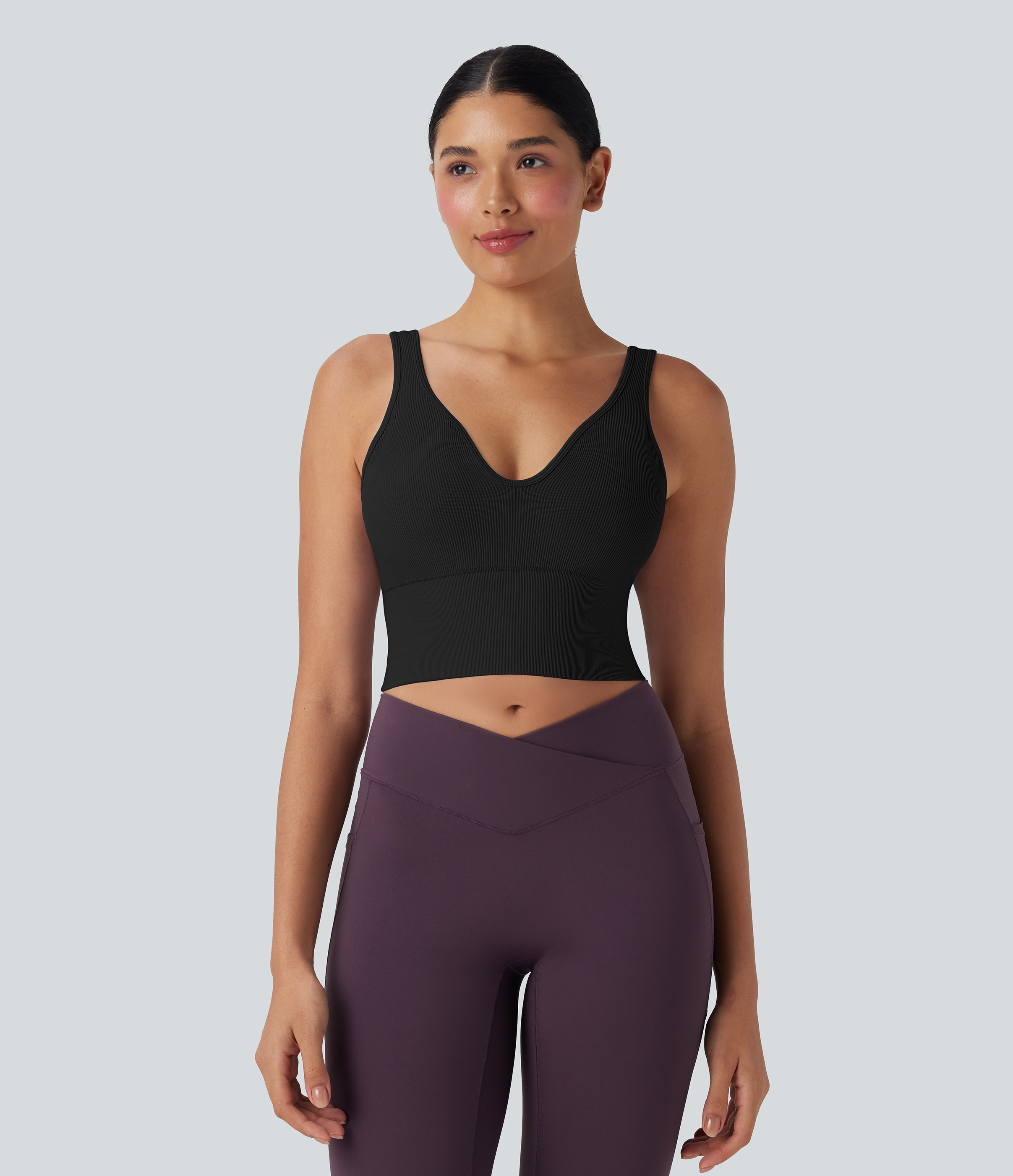 Top de yoga corto fluido sin costuras y con espalda abierta