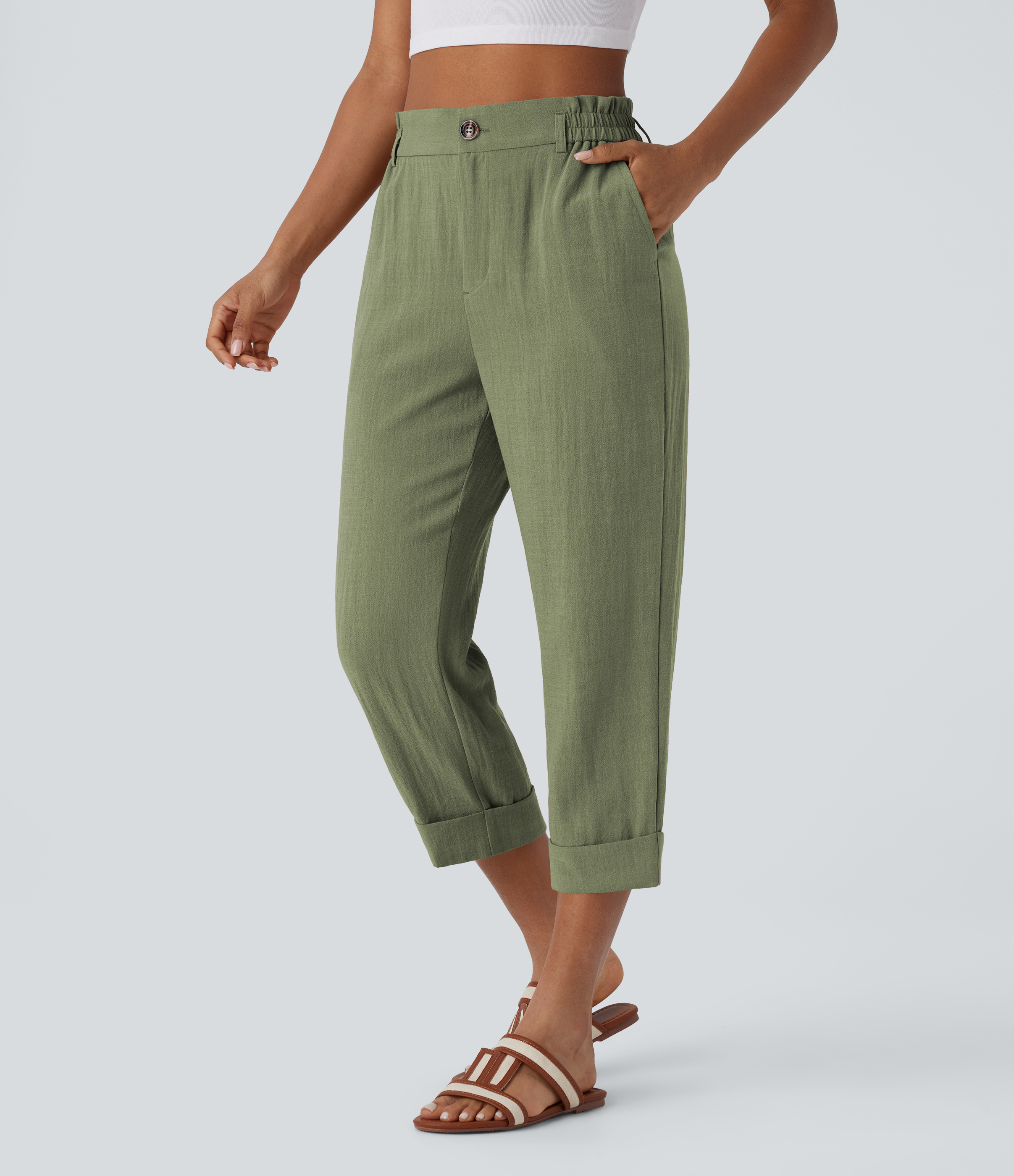 Pantalón capri lino tiro alto bolsillo lateral cremallera botón