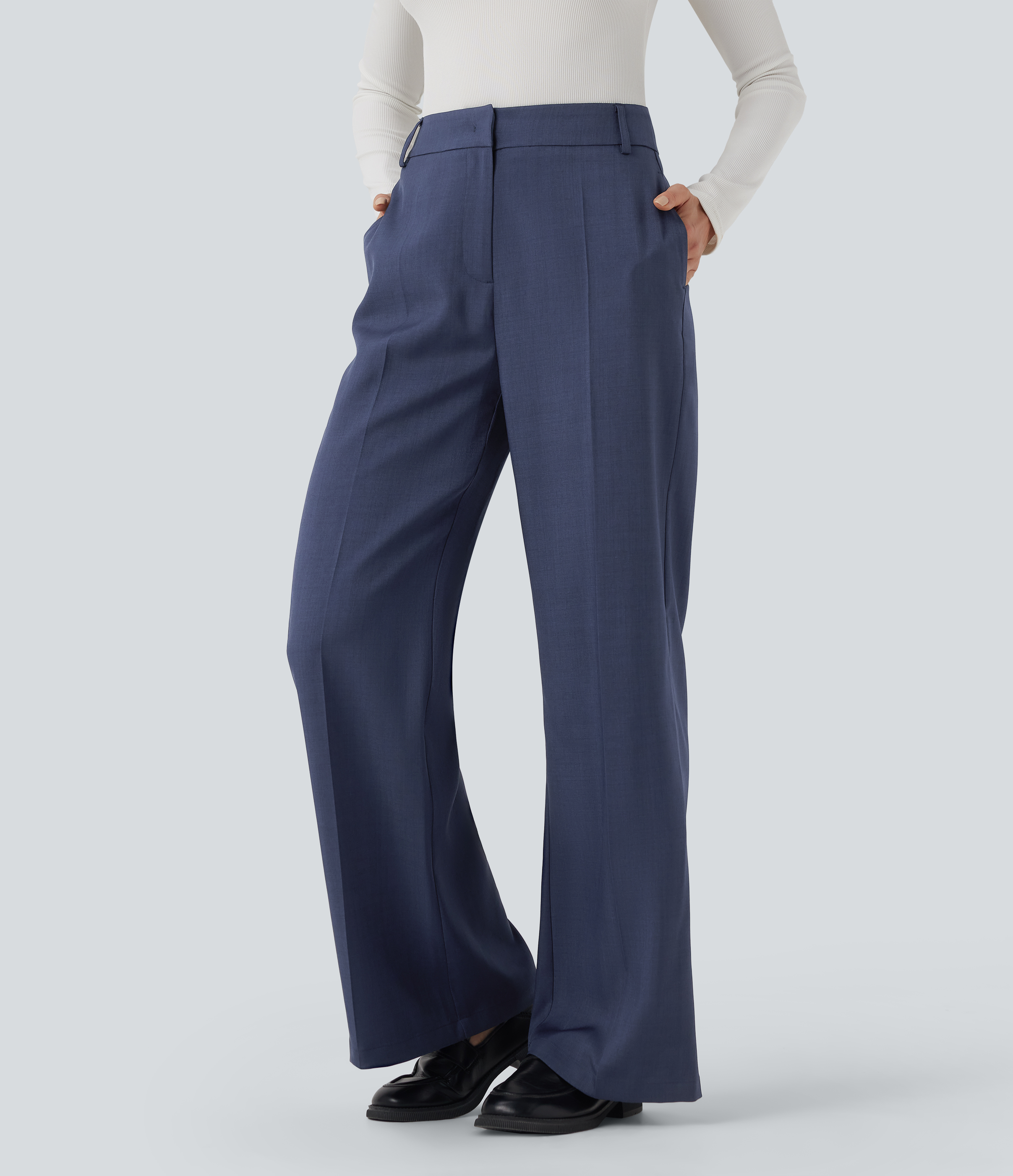 Magas derekú, zsebekkel ellátott munkanadrág bootcut fazonban