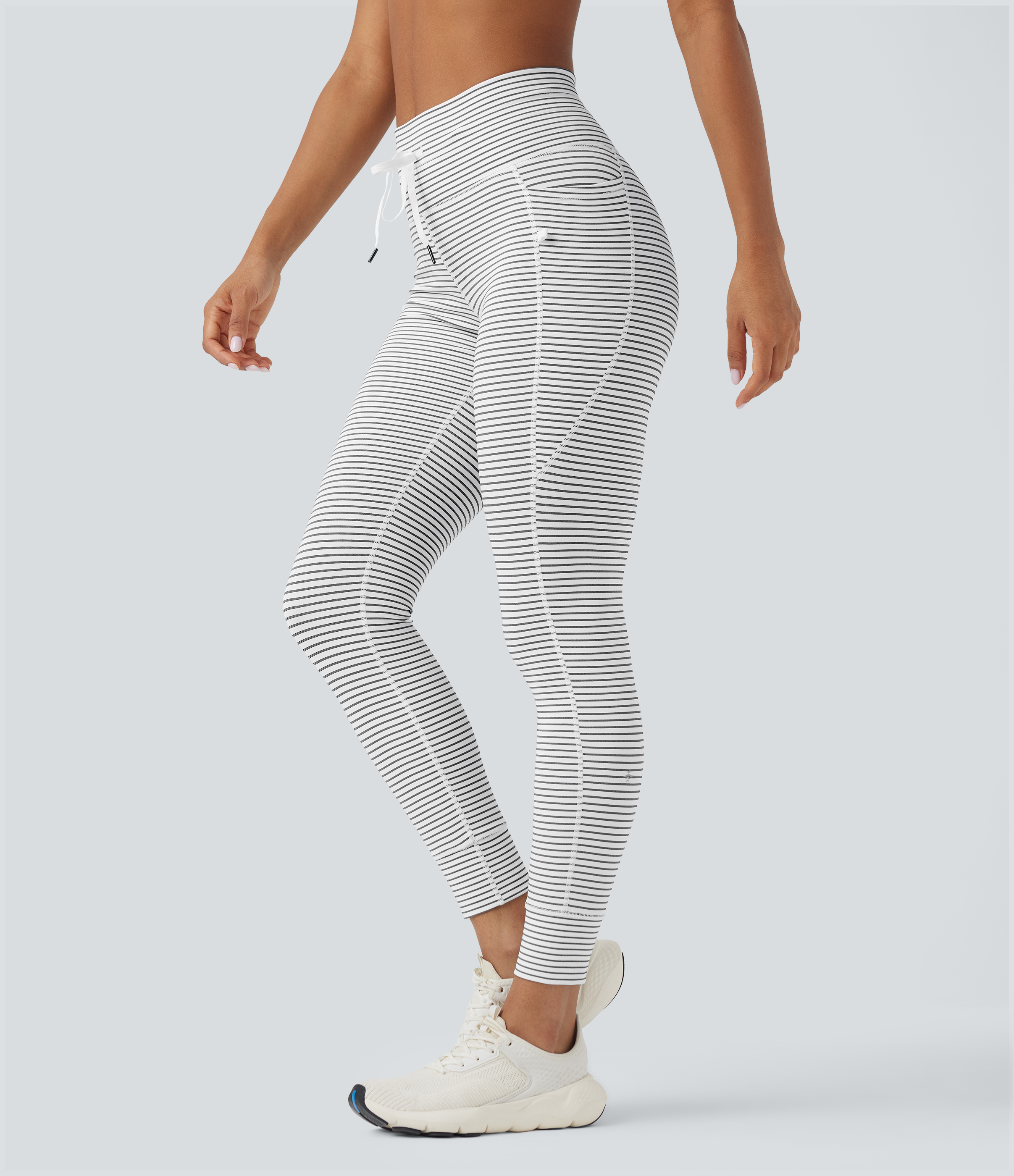 Leggings de yoga rayées à taille haute et cordon de serrage avec poches