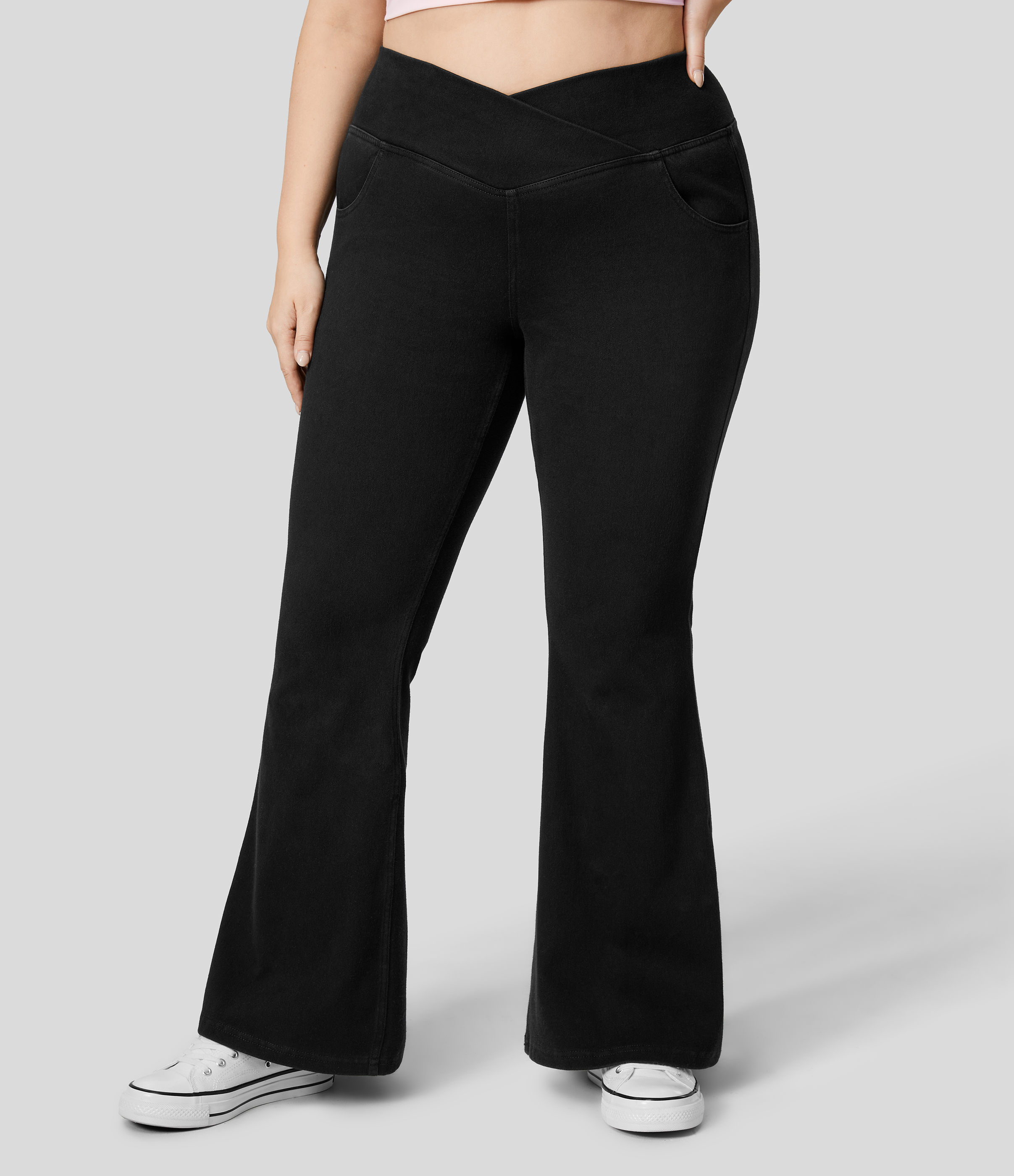 Halara Flex™ Washed Plus-Size Super-Flare Crossover Jeans made from stretchy knit denim with pockets and a high waist