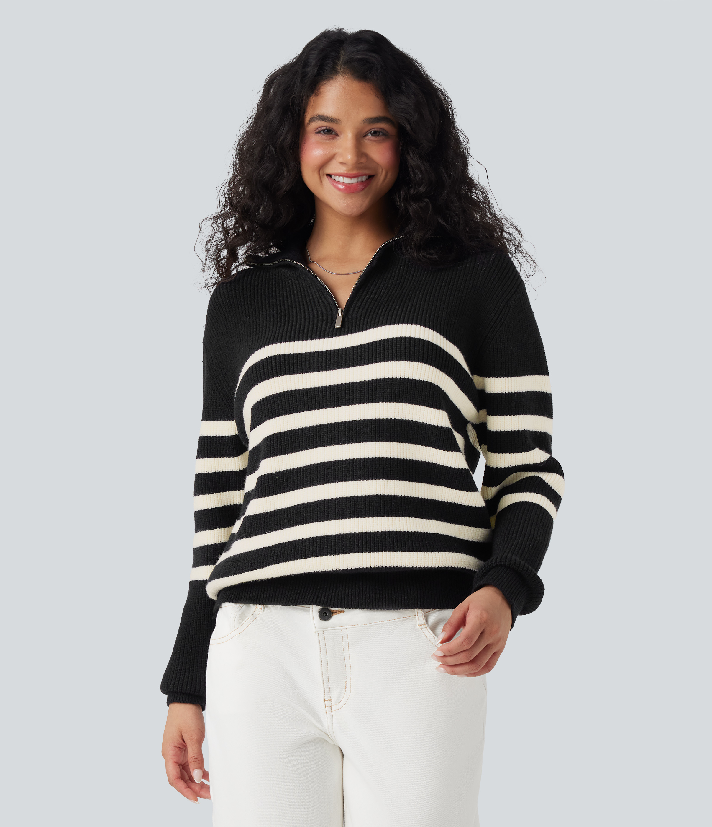 Suéter casual de rayas con bloques de color y solapa con media cremallera