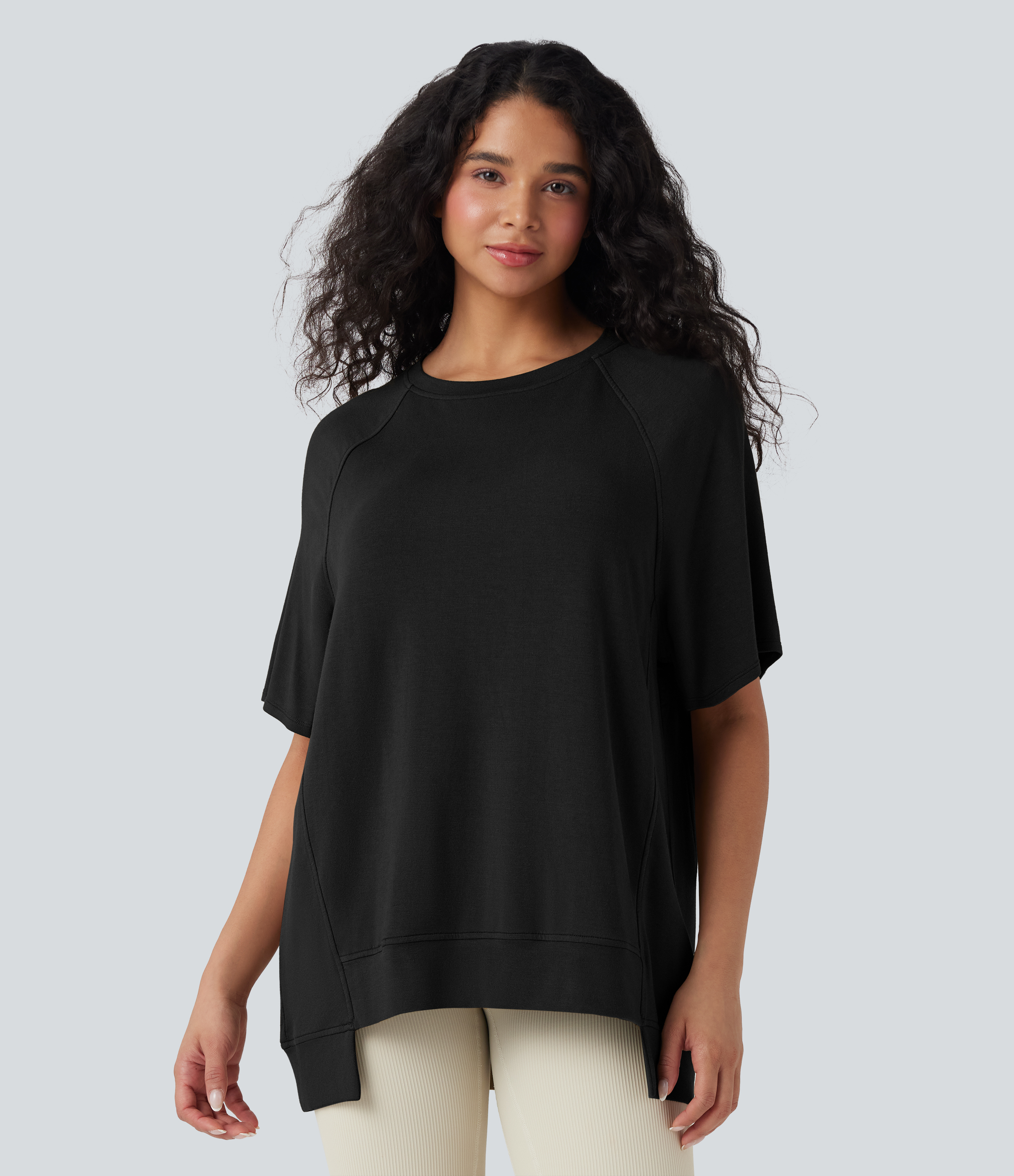 Schwarz Rundhals Kurzarm Casual Top mit asymmetrischem Saum / 1