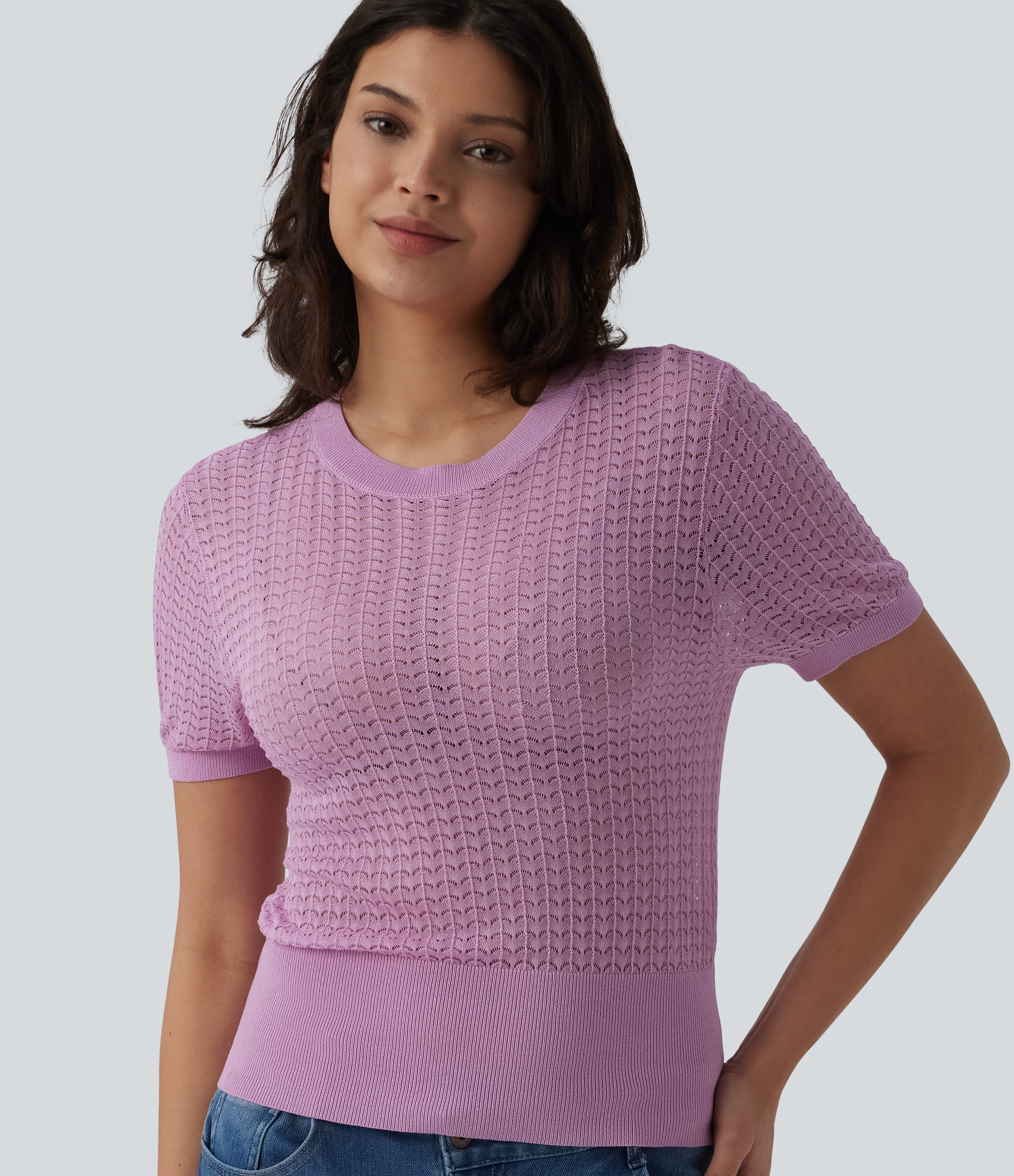 Pull resort col rond manches courtes à découpes ajourées