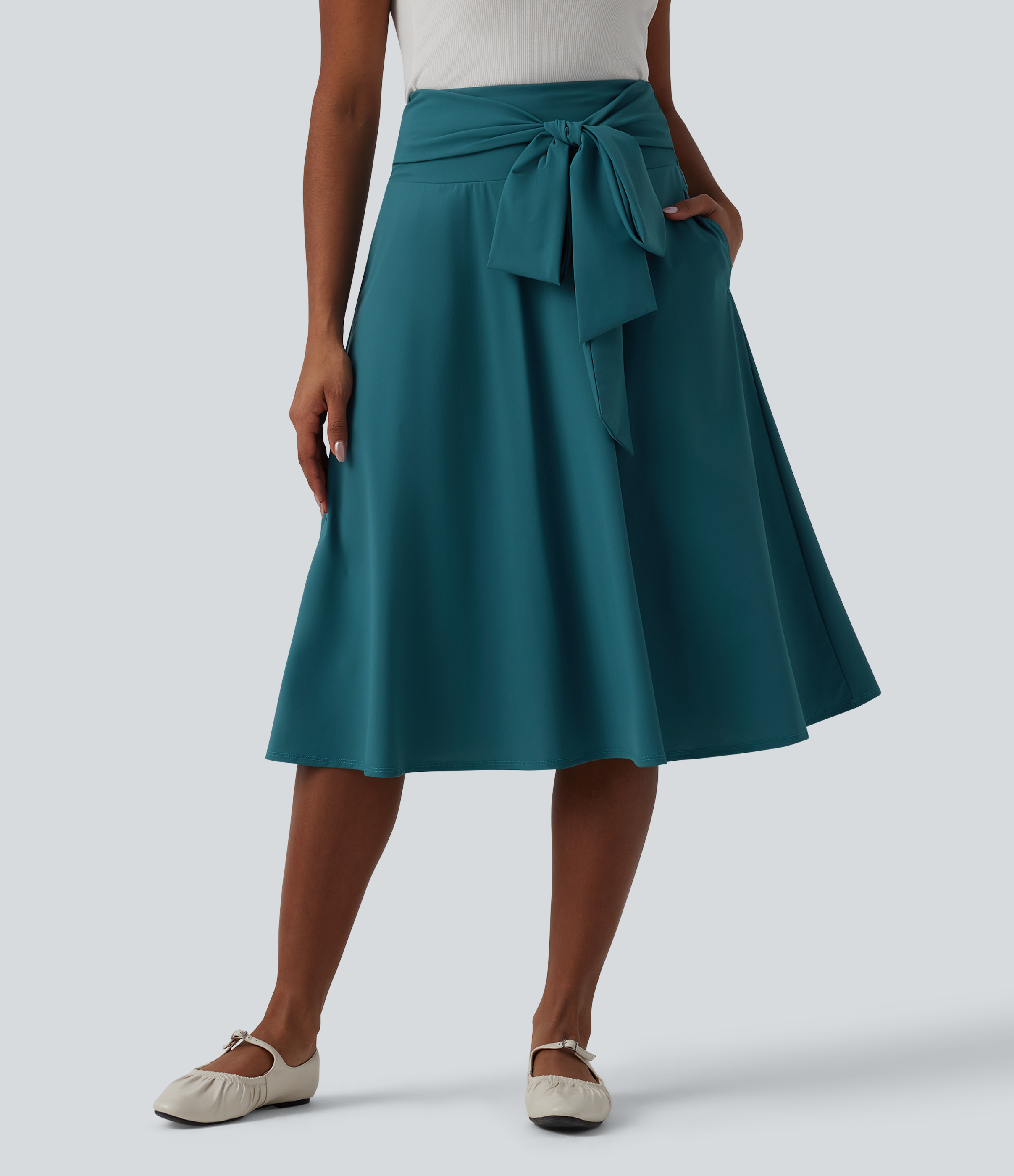 Lässiger Midirock in A-Linie mit hohem Bund und Bindeband vorne
