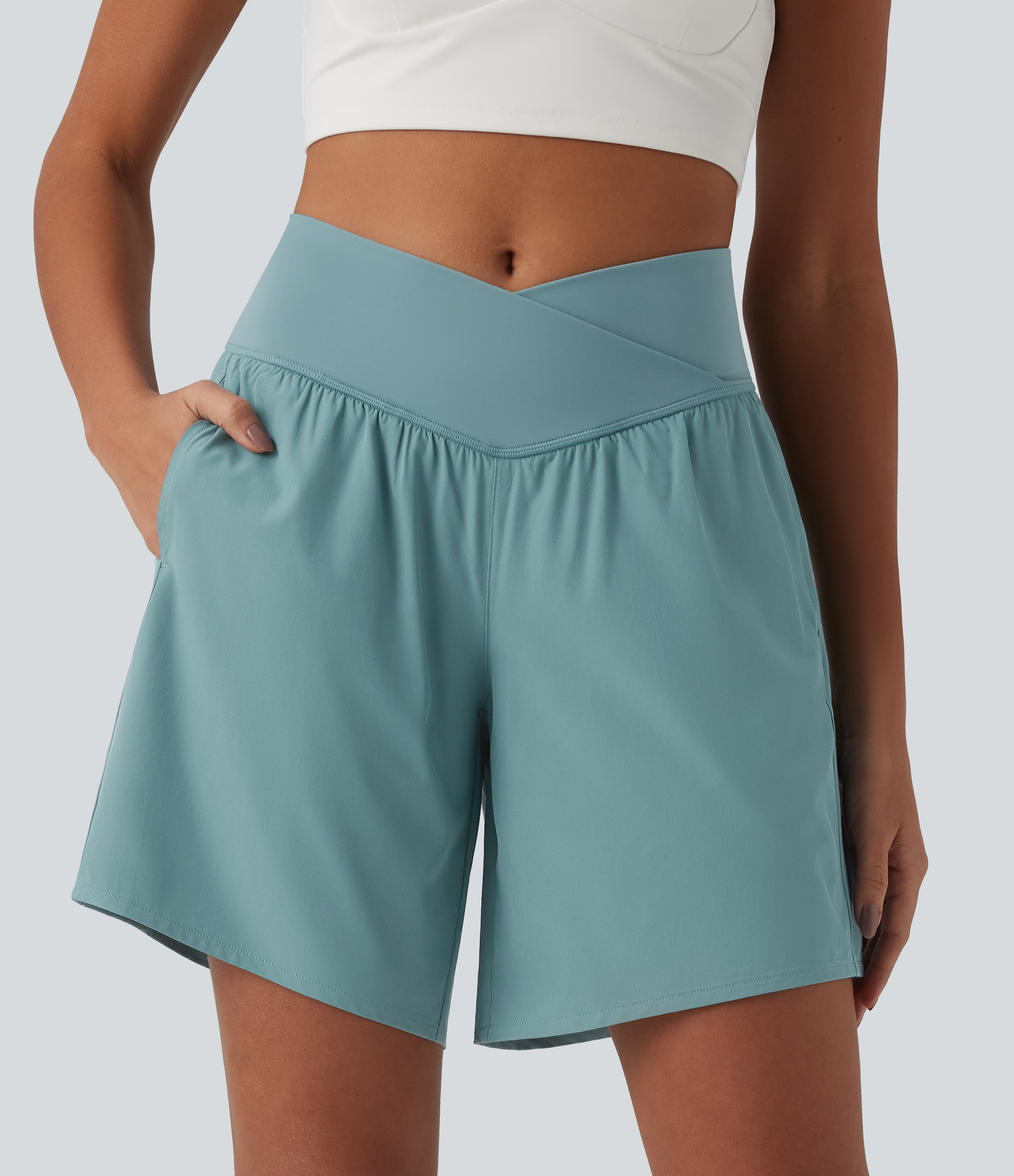 Breezeful™ hoch geschnittene Crossover 2-in-1, schnelltrocknende Yoga-Shorts 7'' mit Taschen