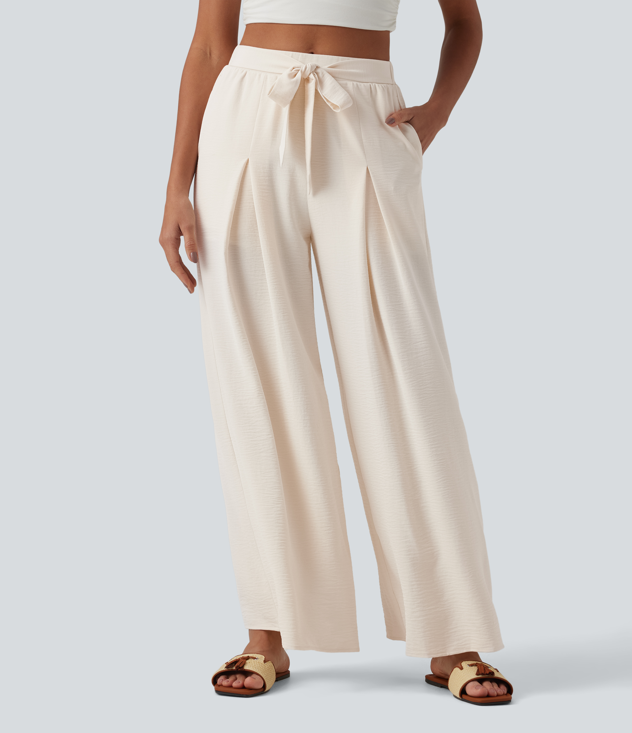 Pantalon large resort taille haute aspect lin avec nœud frontal et poches - Short intégré