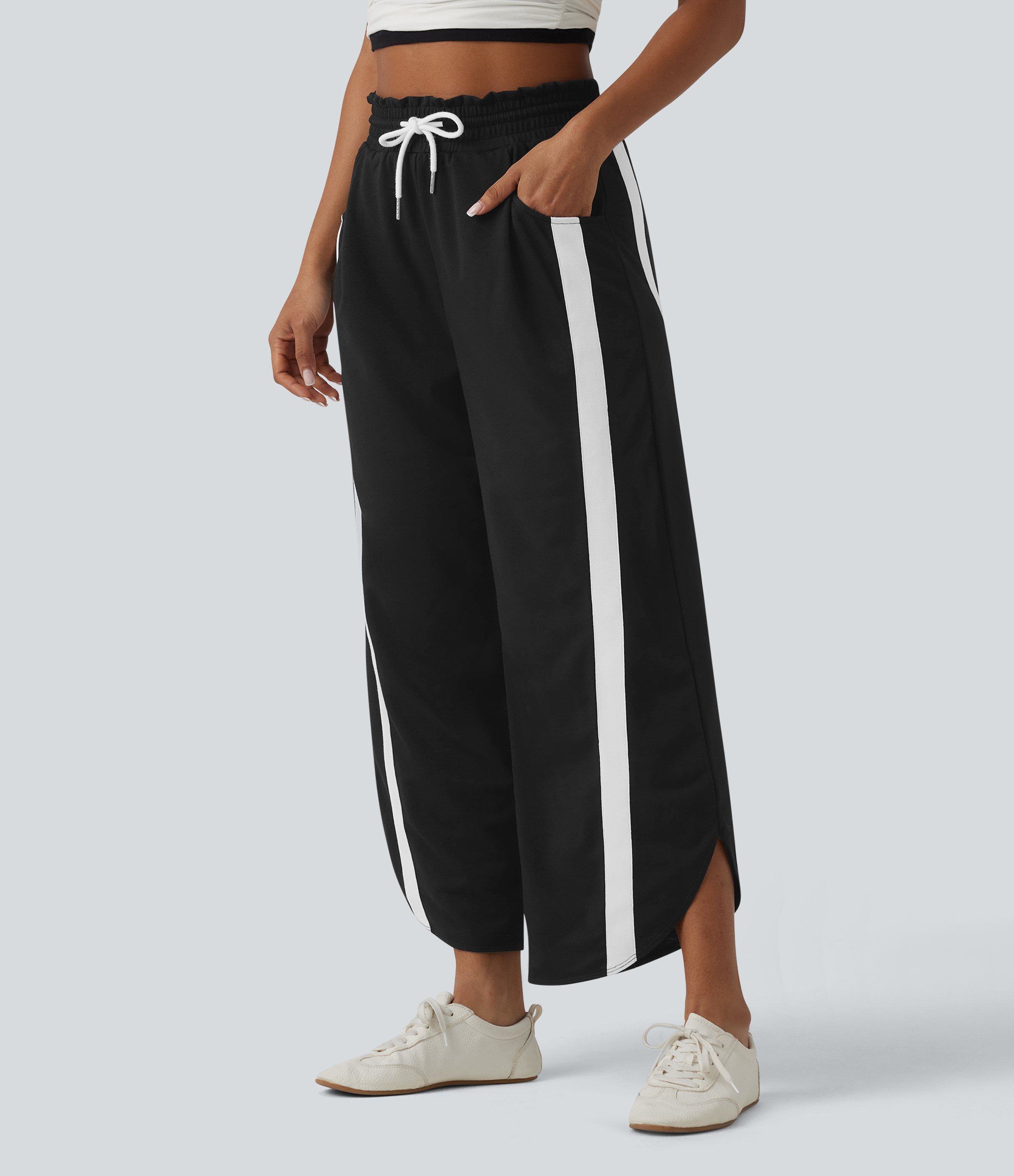 Hoch geschnittene Sweatpants mit Kordelzug, geschwungenem Saum, Color-Block-Design, weitem Schnitt und Taschen